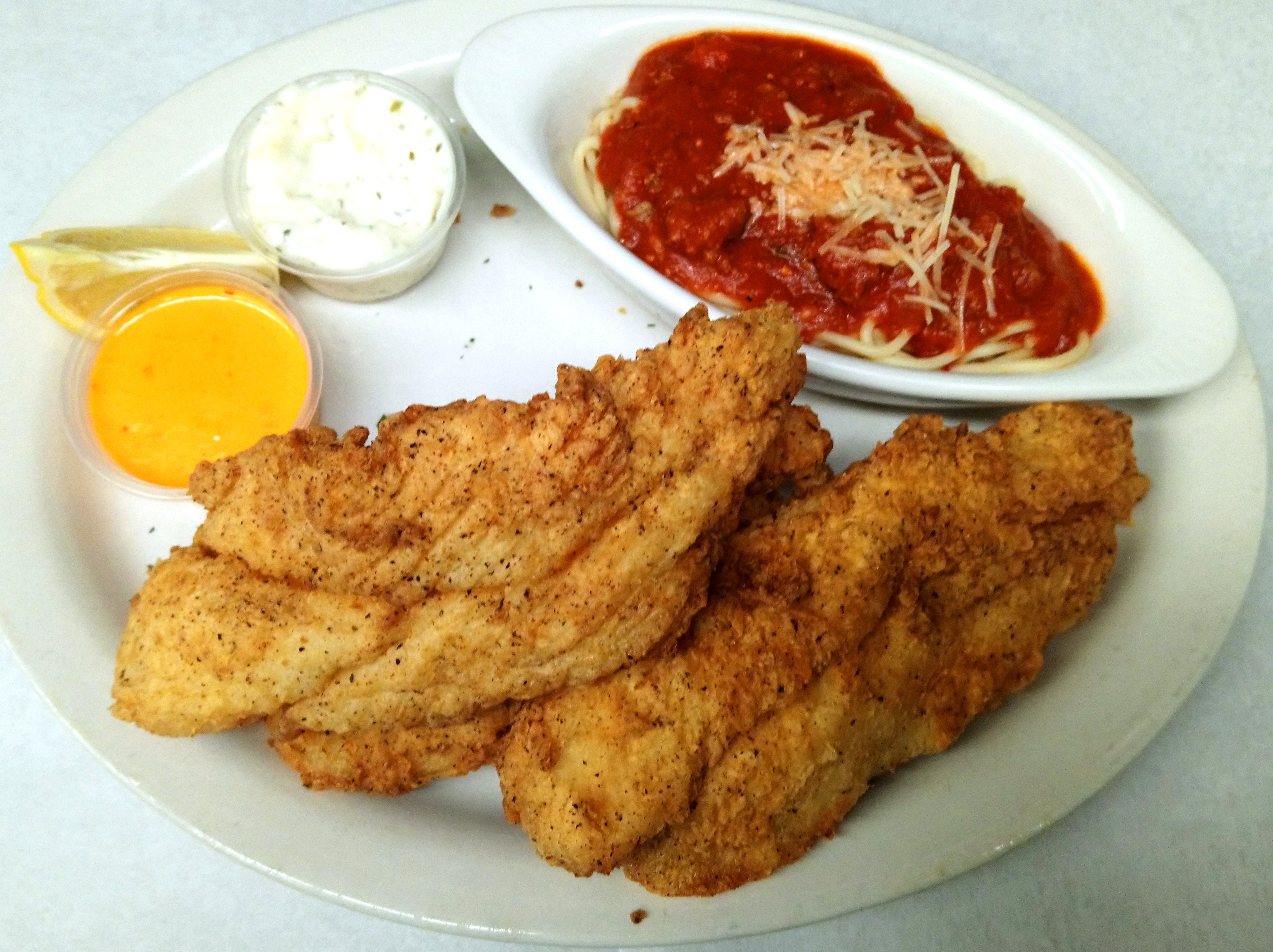 Order Leona's Classic Catfish Dinner food online from Leona's Pizza store, Chicago on bringmethat.com