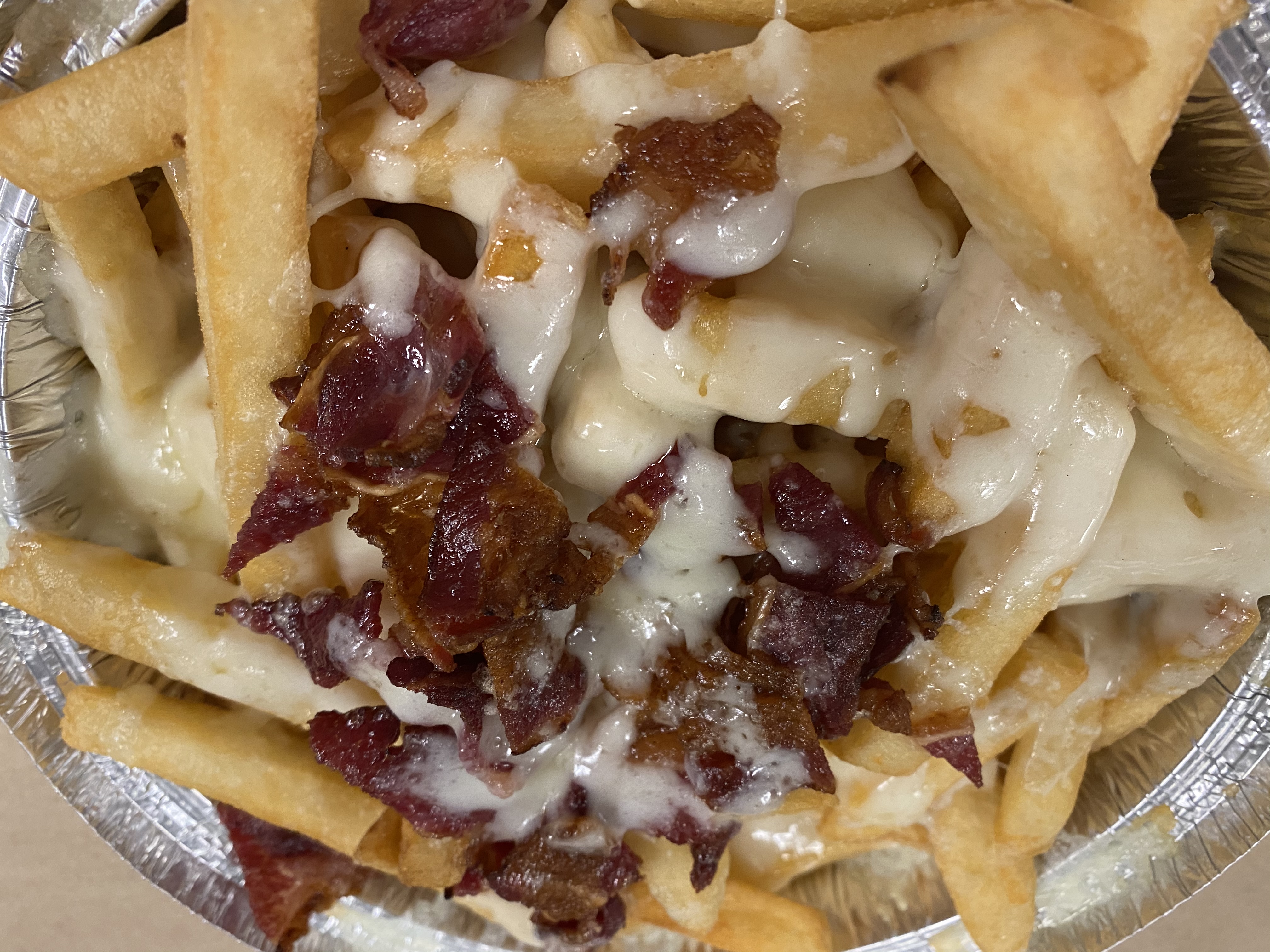 Order Cheesy Fries with Bacon food online from Bravo Pizza store, Malden on bringmethat.com