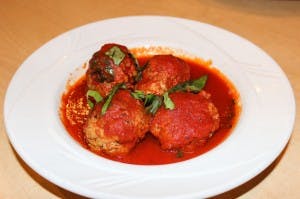Order Homemade Italian Style Meatballs - 4 Pieces food online from Piazzetta Of East Farmingdale store, Farmingdale on bringmethat.com