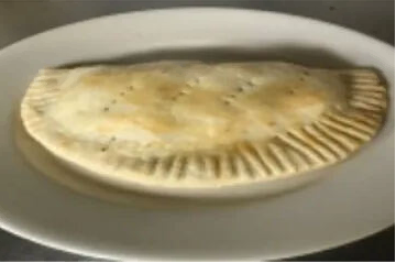 Order Meat Pie food online from African Grill And Bar store, Denver on bringmethat.com