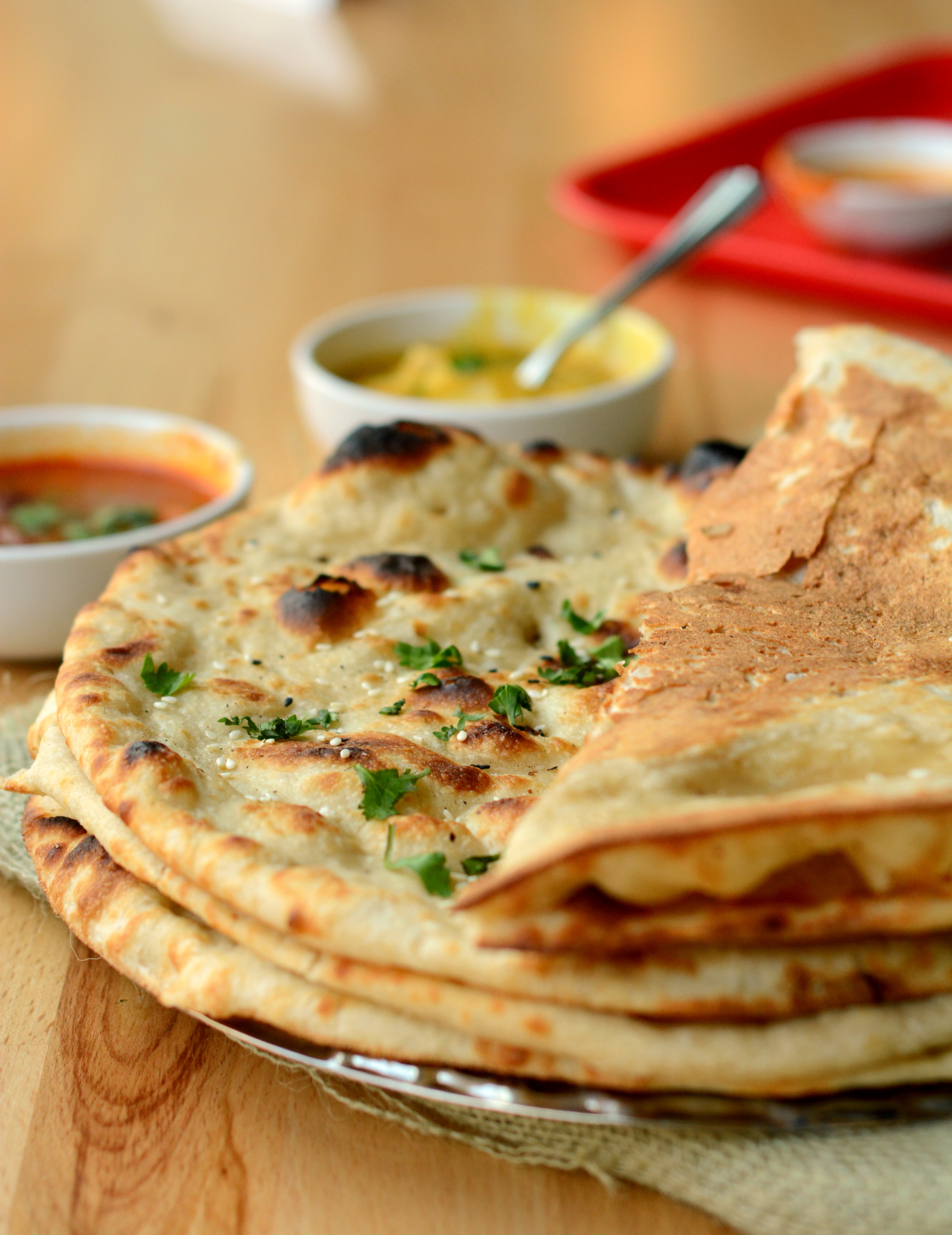 Order 65. Garlic Naan  food online from Bawarchi store, New York on bringmethat.com
