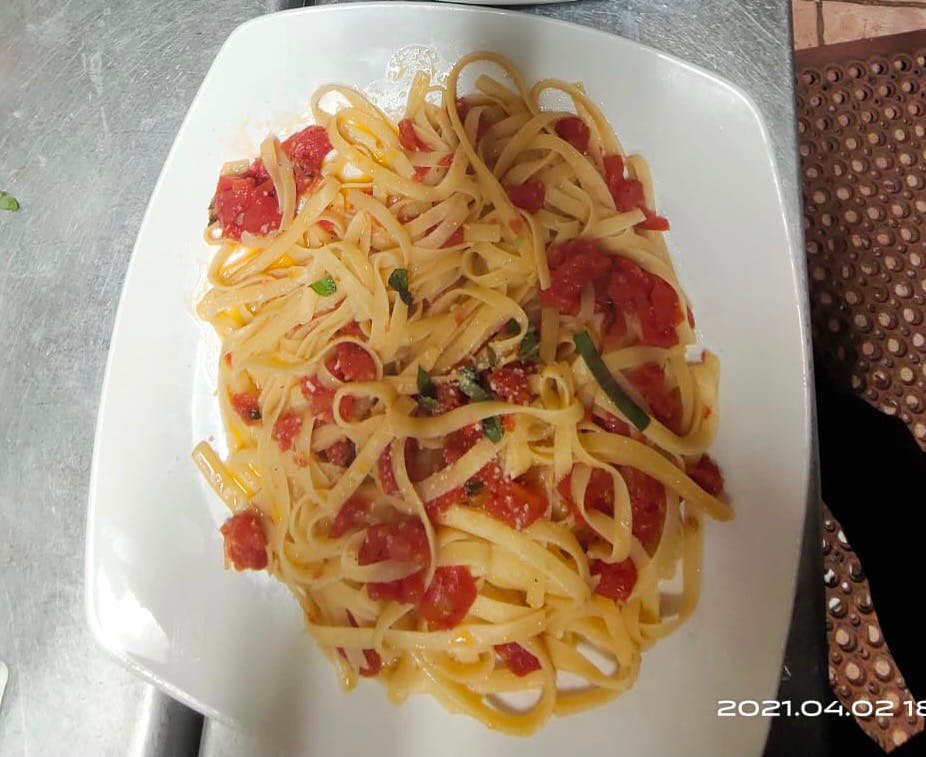 Order Red Pesto Pasta - Pasta food online from Nino Italian Restaurant store, Reading on bringmethat.com