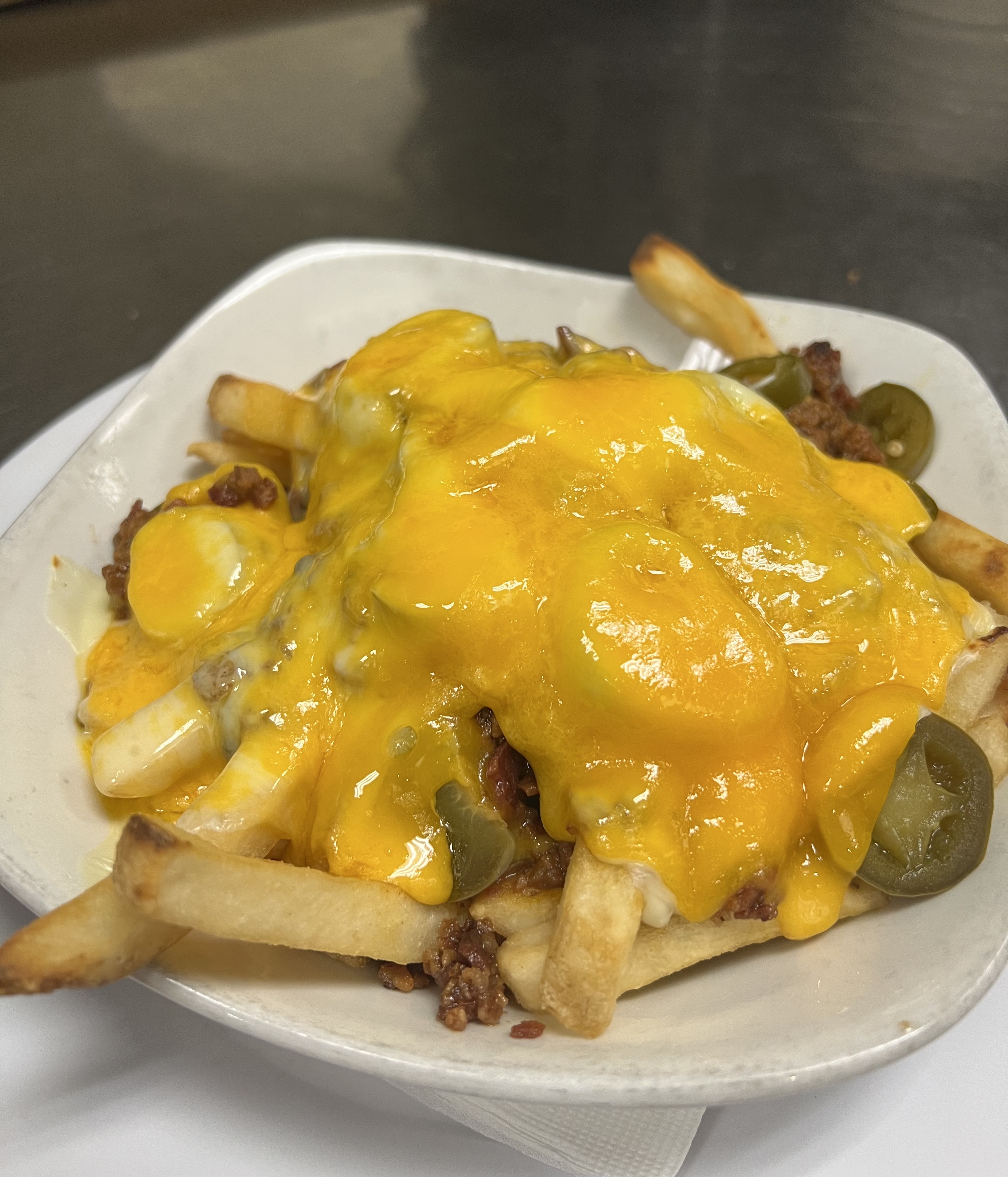 Order Chili Cheese Loaded Fries food online from The Mystic Diner & Restaurant store, Stonington on bringmethat.com
