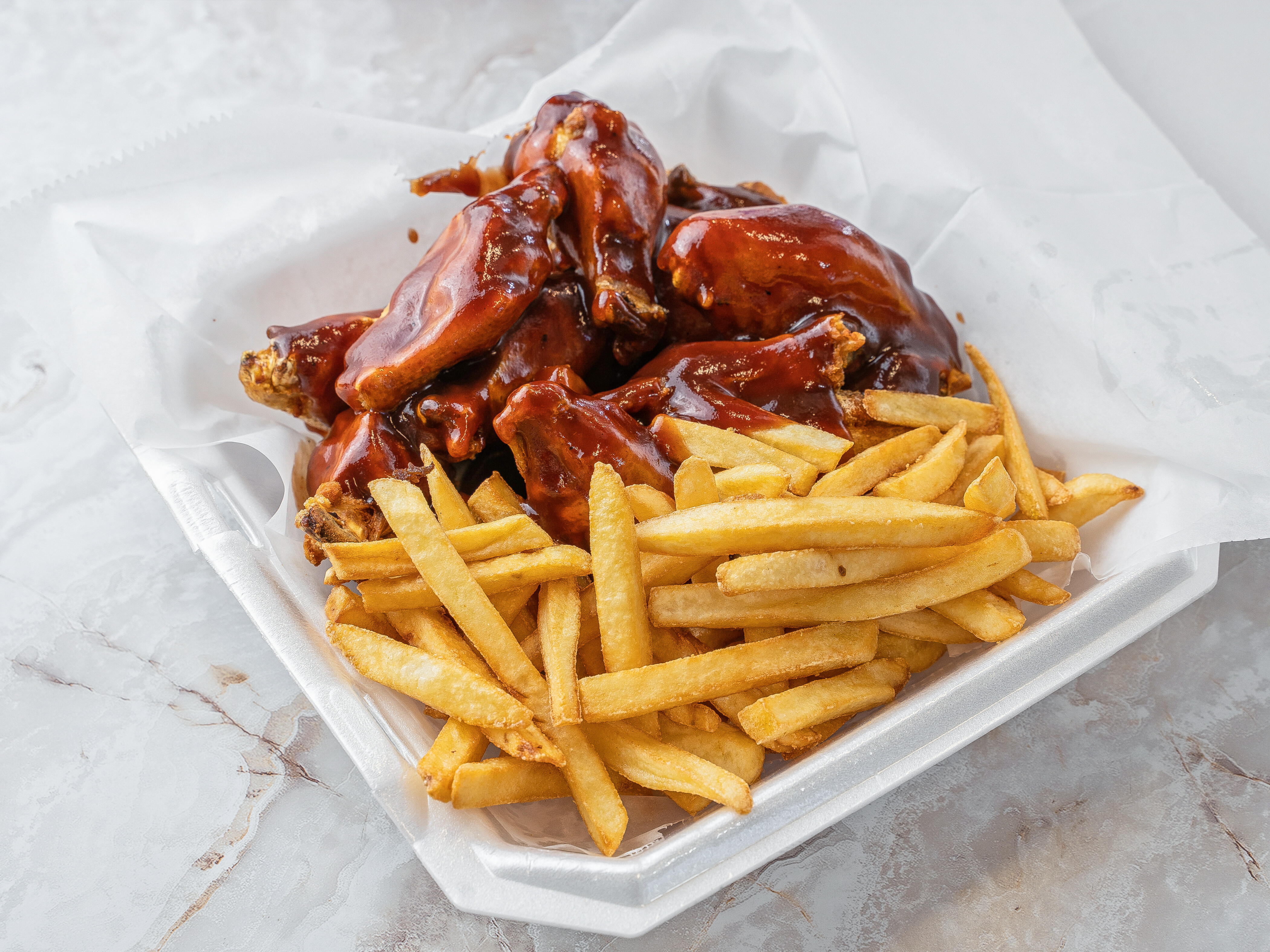 Order 10 Wings and Fries food online from Noda Market & Deli store, Charlotte on bringmethat.com
