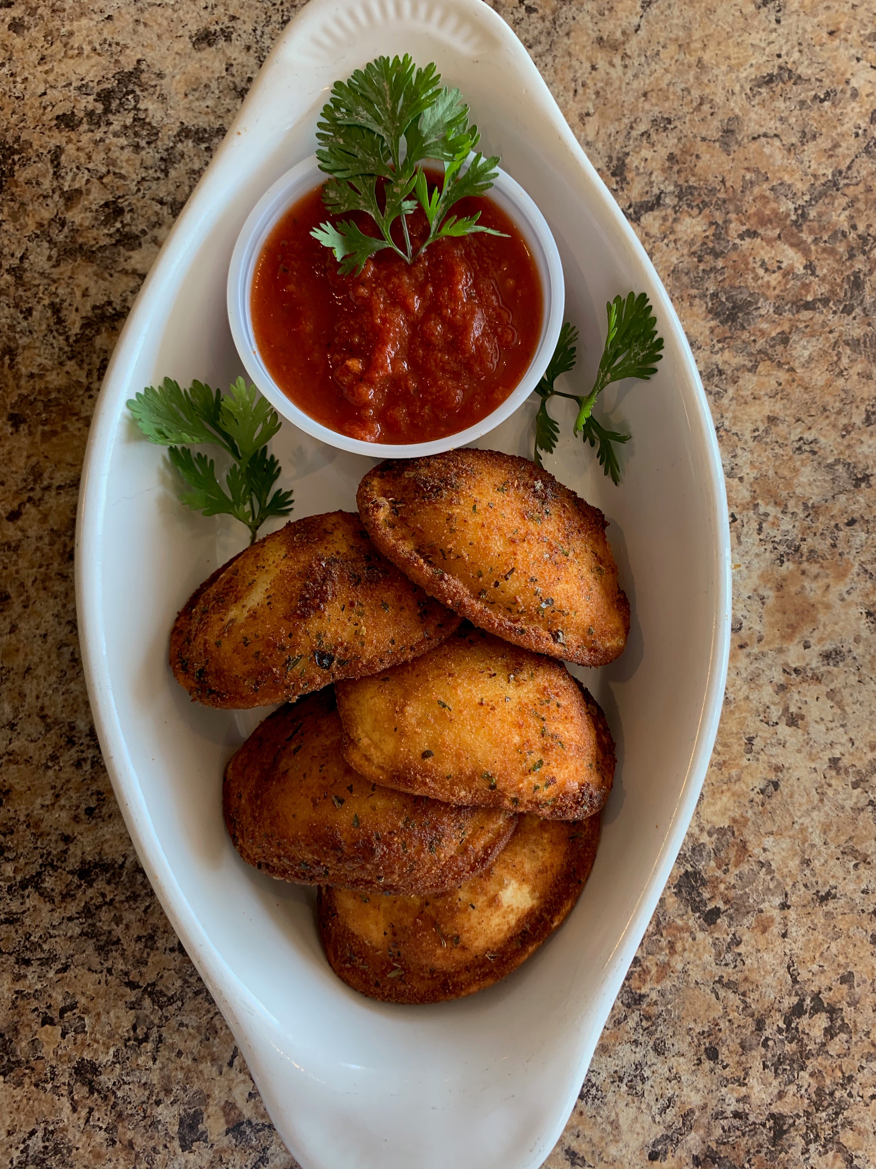Order 5 Toasted Ravioli food online from Romes Pizza store, Helotes on bringmethat.com