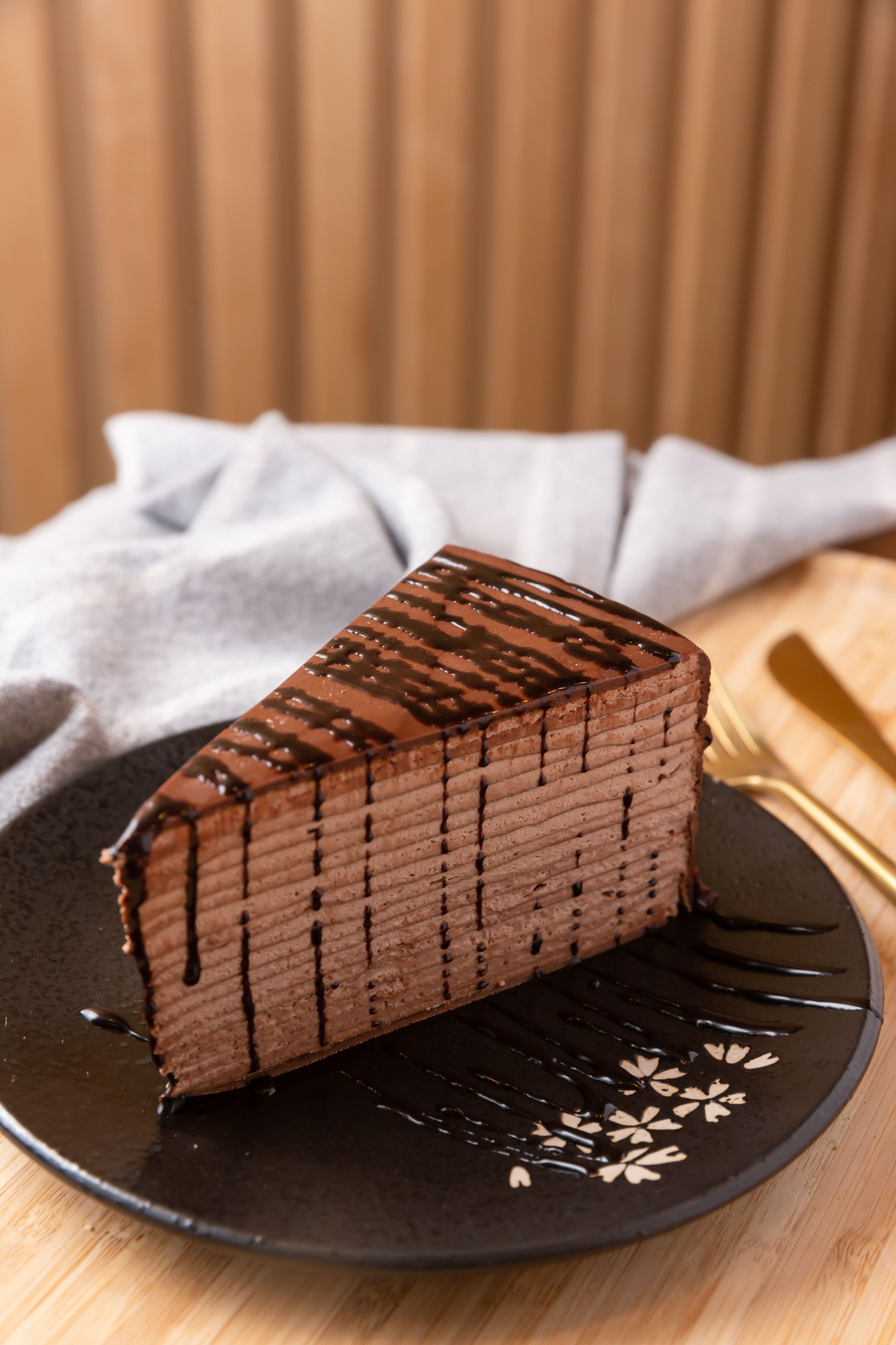 Order Chocolate Crepe Layer Cake food online from Kyoto Matcha store, Rockville on bringmethat.com