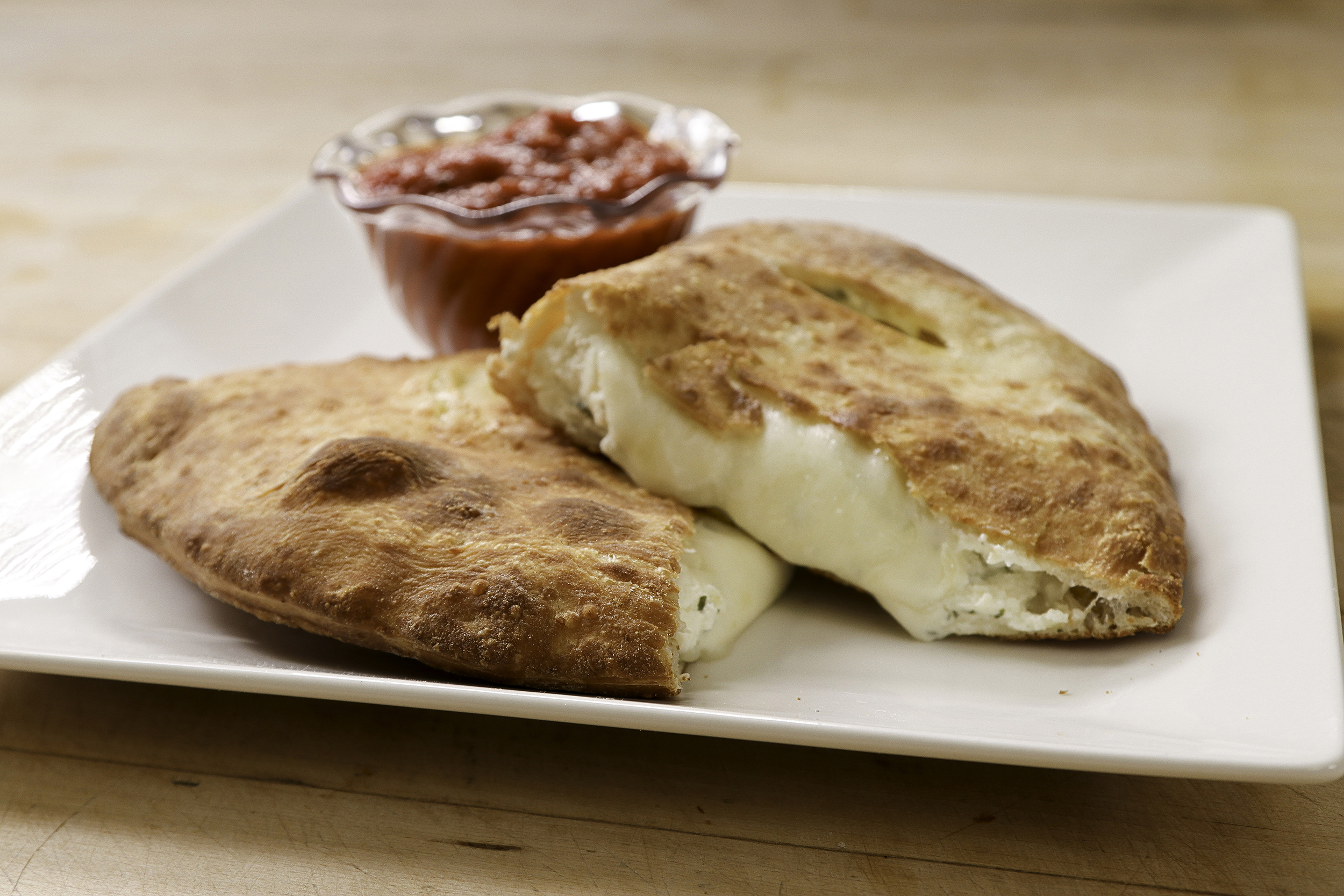 Order Cheese Calzone food online from Ameci Pizza & Pasta store, Lake Forest on bringmethat.com