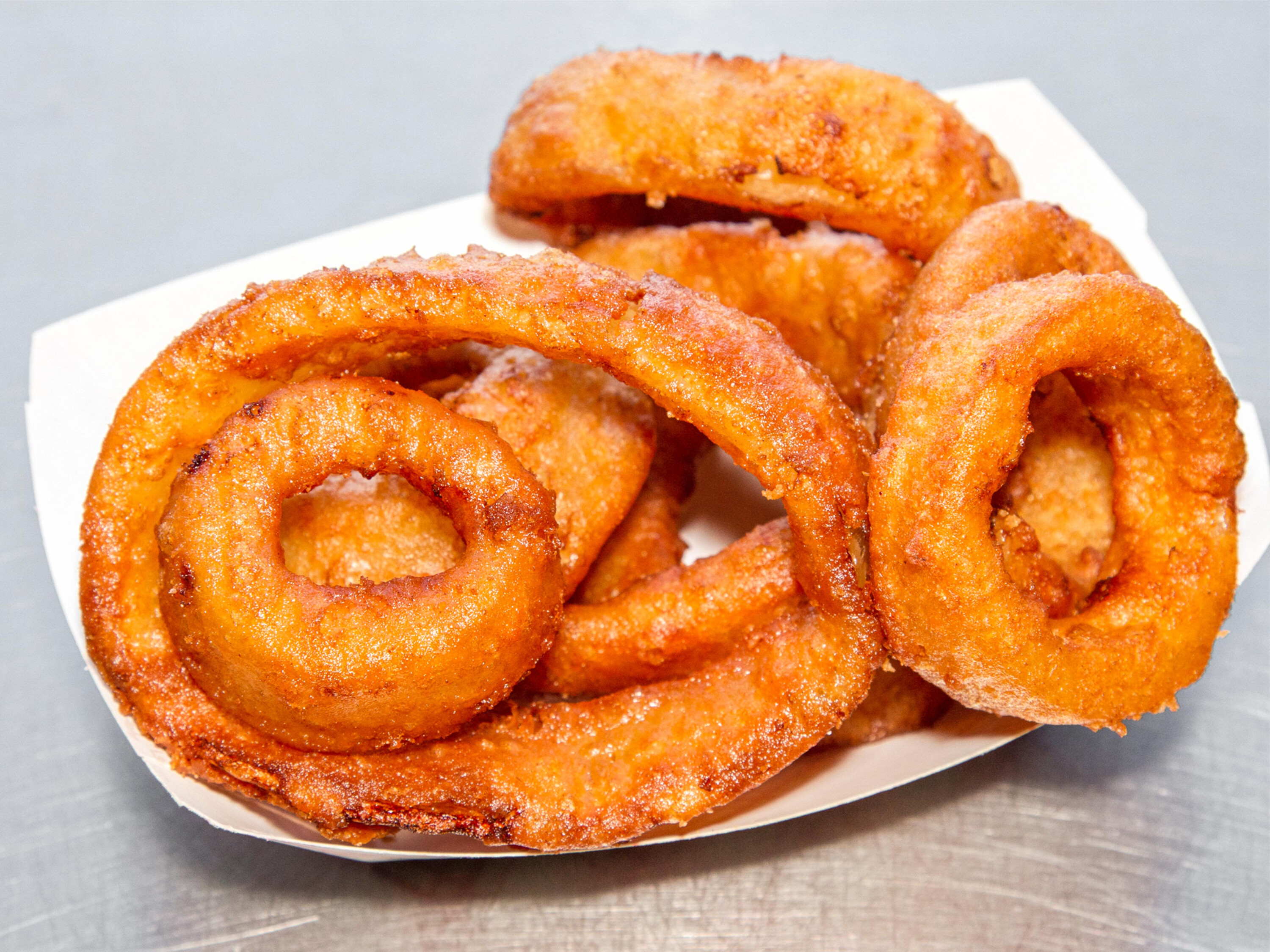 Order Onion Rings food online from Mom & Pop Pizza & Subs store, California on bringmethat.com