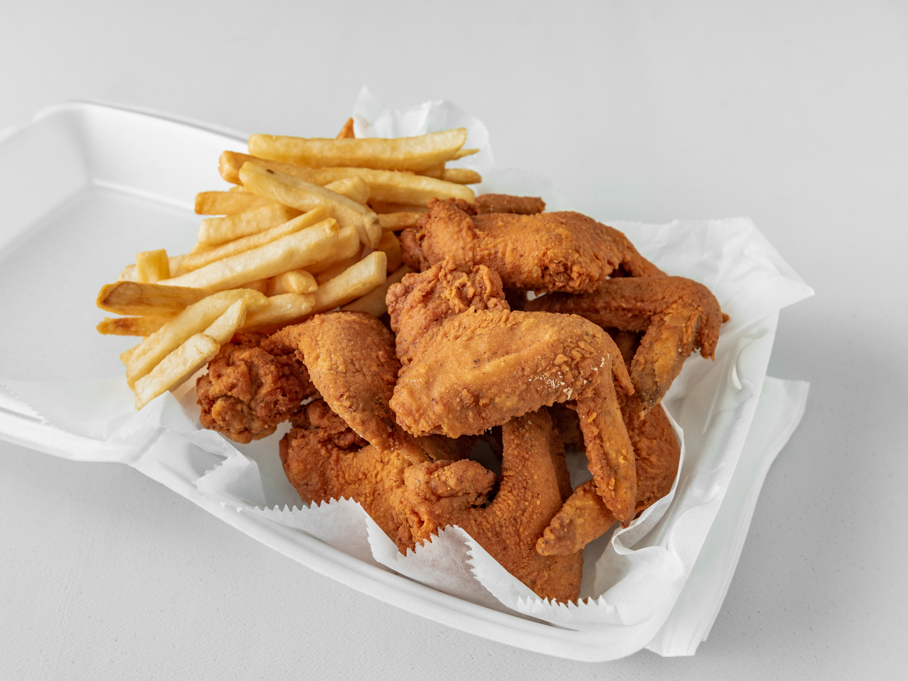 Order Chicken Nuggets with Fries food online from Truth Ribzzz & More store, Chicago on bringmethat.com