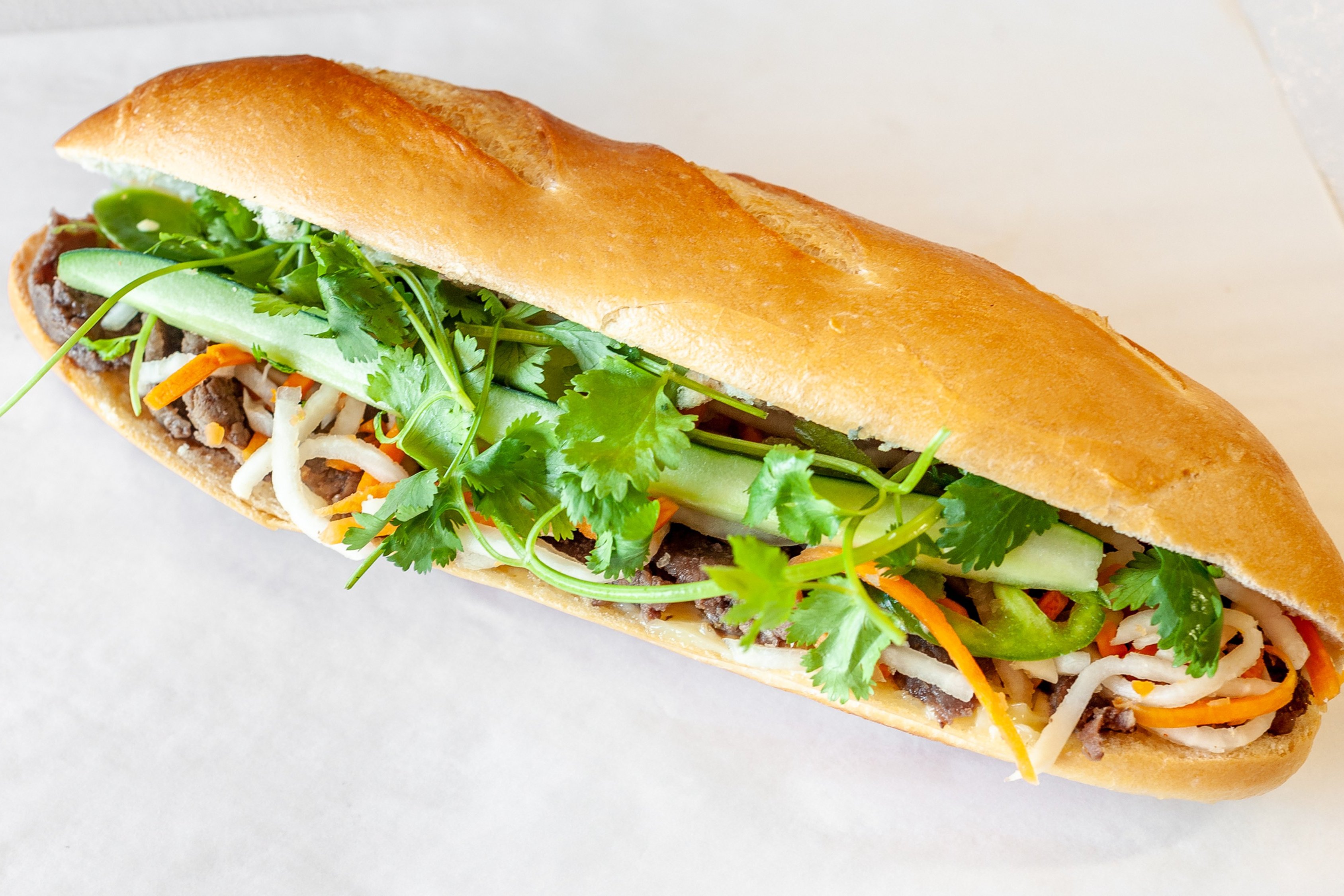 Order 17. Grilled Beef food online from Banh Mi Oven store, San Jose on bringmethat.com