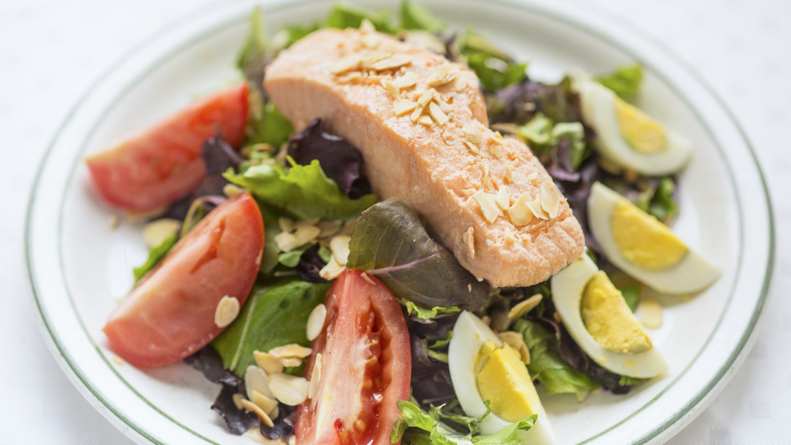 Order Grilled Salmon Salad food online from California Pasta Delivery store, Santa Barbara on bringmethat.com