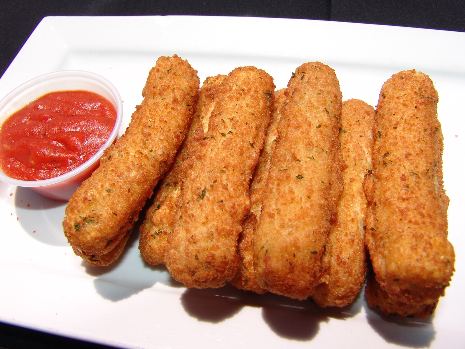 Order 5. Mozzarella Cheese Sticks food online from Little Henry's store, San Francisco on bringmethat.com