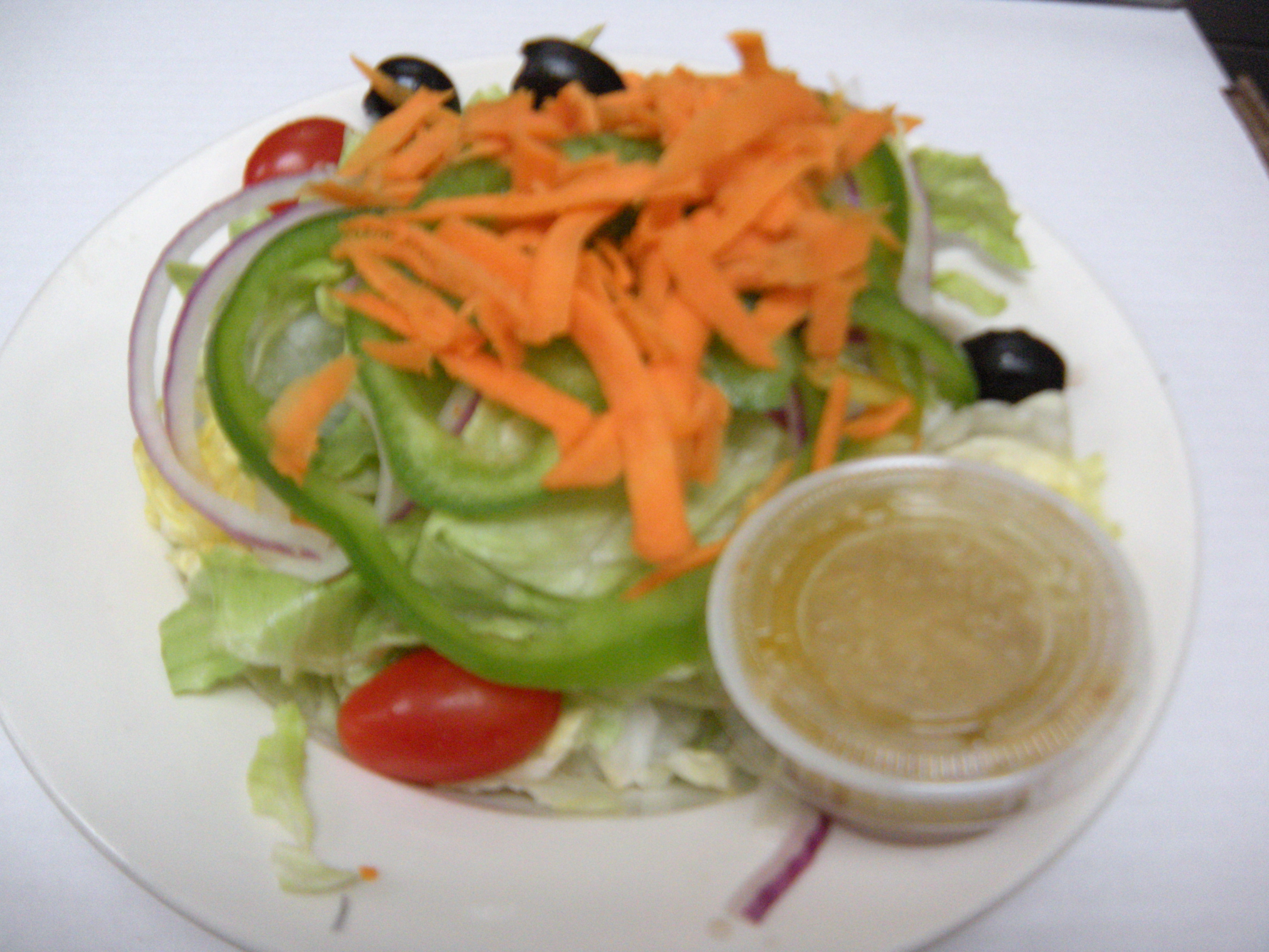 Order Garden Salad food online from Silvio Restaurant & Pizzeria store, Thornwood on bringmethat.com