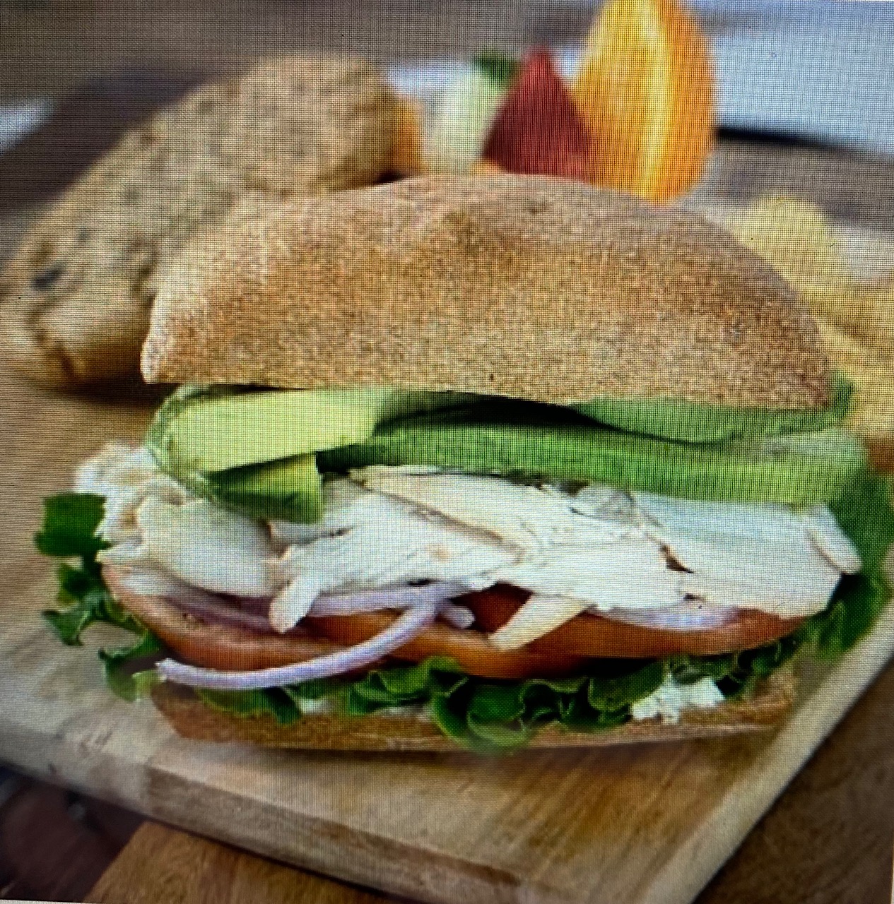 Order Turkey, Avocado, Tomato and Greens Sandwich food online from Town Hall Deli store, Englewood on bringmethat.com