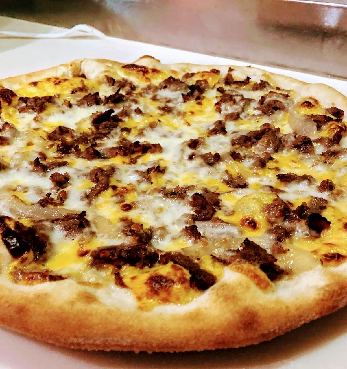 Order Philly Cheesesteak Pizza - Personal 12" food online from Gerardo Pizzeria Restaurant store, Mt Kisco on bringmethat.com