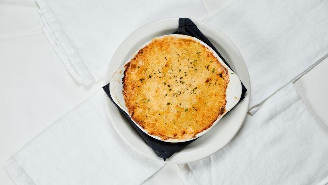Order Au Gratin Potatoes food online from Kirby Prime Steakhouse store, The Woodlands on bringmethat.com