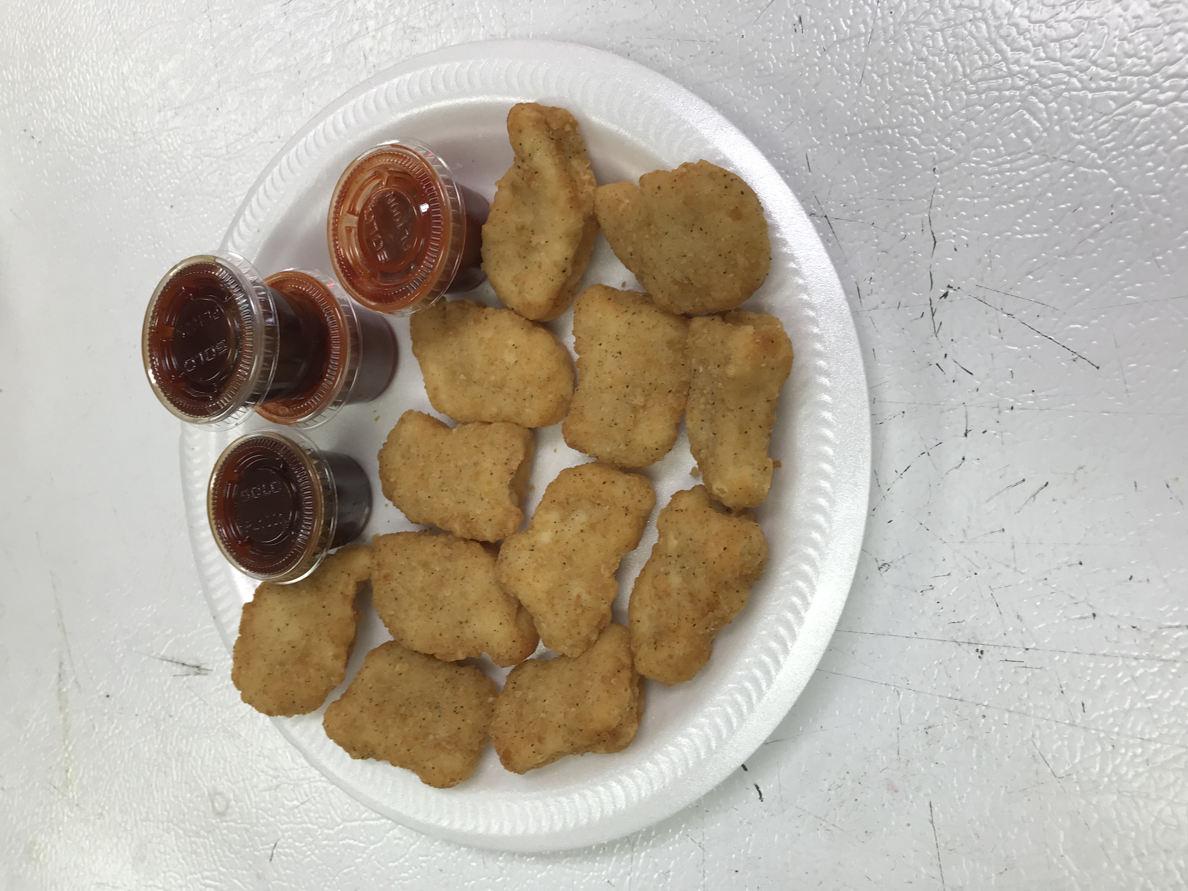 Order 12 Pieces Chicken Nuggets food online from Convenient Food Mart store, Cleveland on bringmethat.com