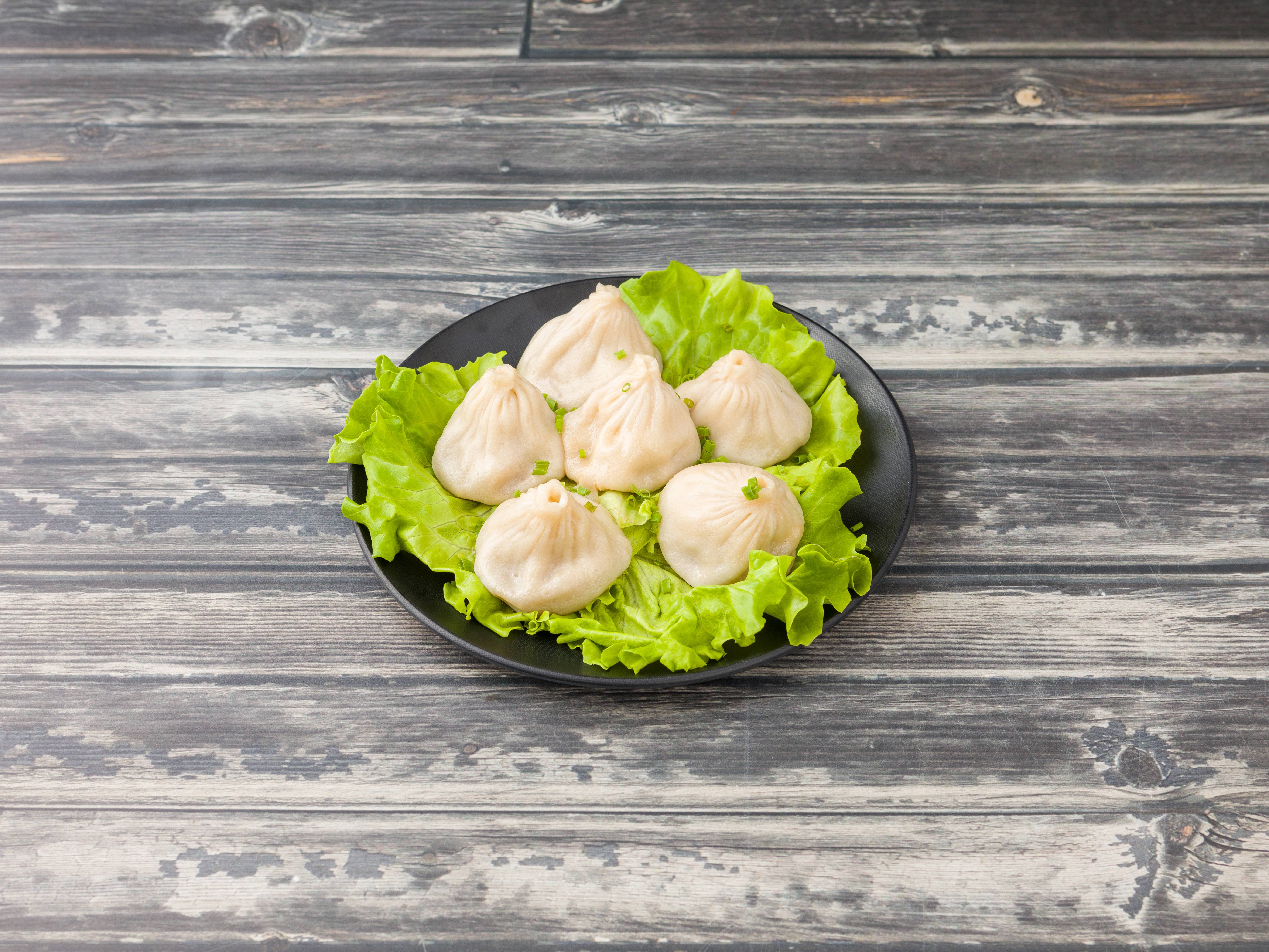 Order Pork Soup Dumpling 小笼包 food online from Grand Sichuan store, Jersey City on bringmethat.com