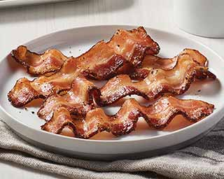 Order Signature™ Thick-Sliced Pepper Bacon food online from Schwan Food Co store, Flagstaff on bringmethat.com