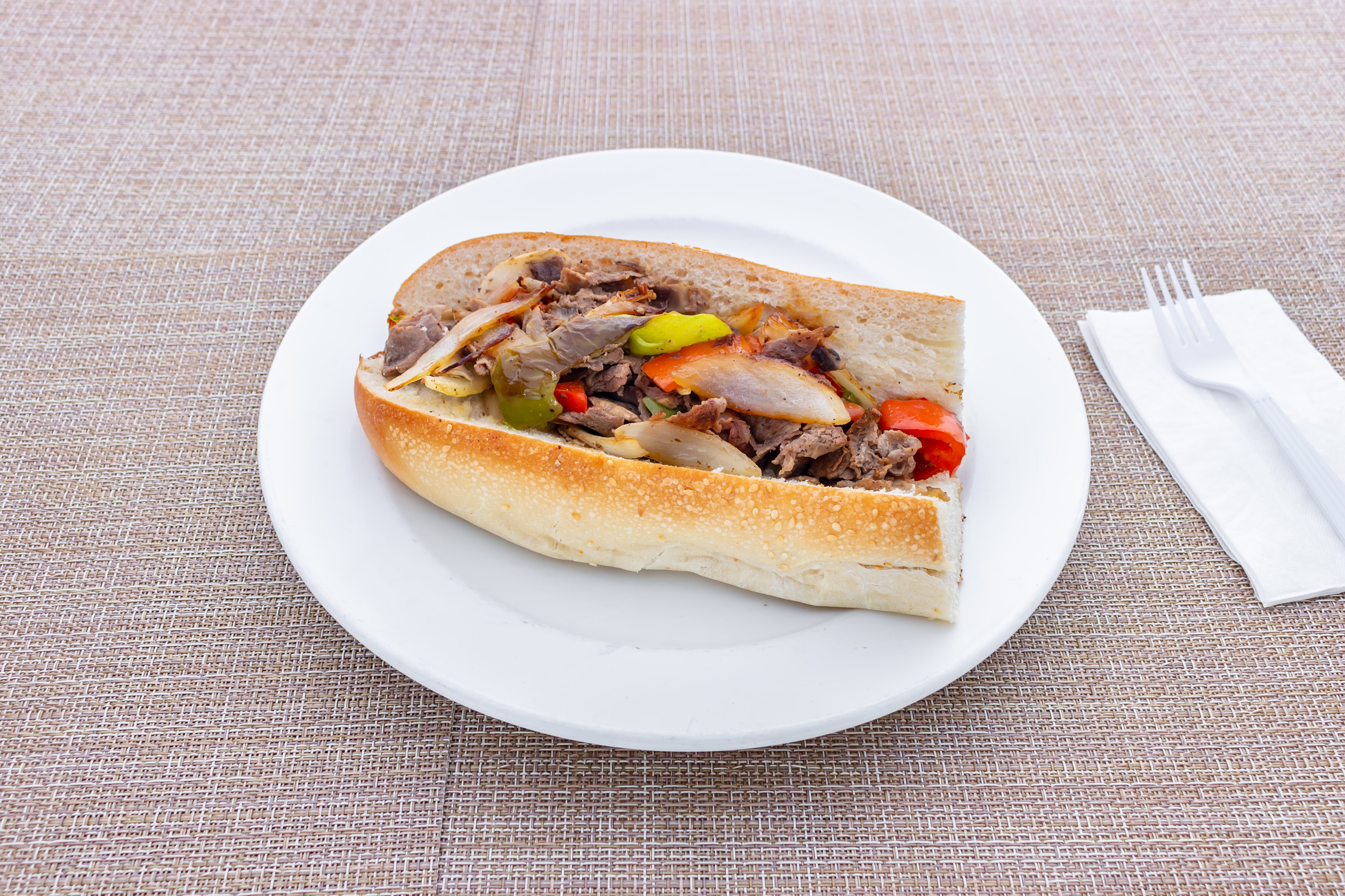 Order Cheesesteak Sandwich - Half food online from Ralphy's Pizza And Restaurant store, Paramus on bringmethat.com