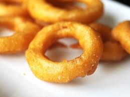 Order Onion Rings food online from Nostra Pizza store, Greensboro on bringmethat.com