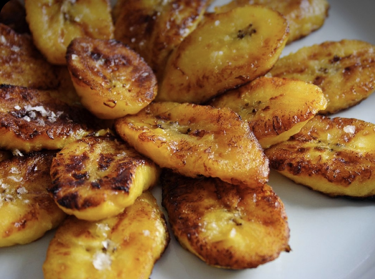 Order FRIED YELLOW SWEET PLANTAINS food online from Paradise Jamaican Cuisine store, Morrisville on bringmethat.com