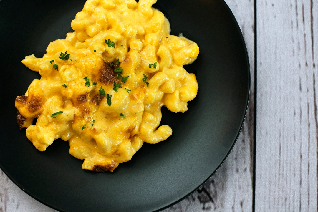 Order Baked Macaroni & Cheese food online from Busy Bee Cafe store, Atlanta on bringmethat.com