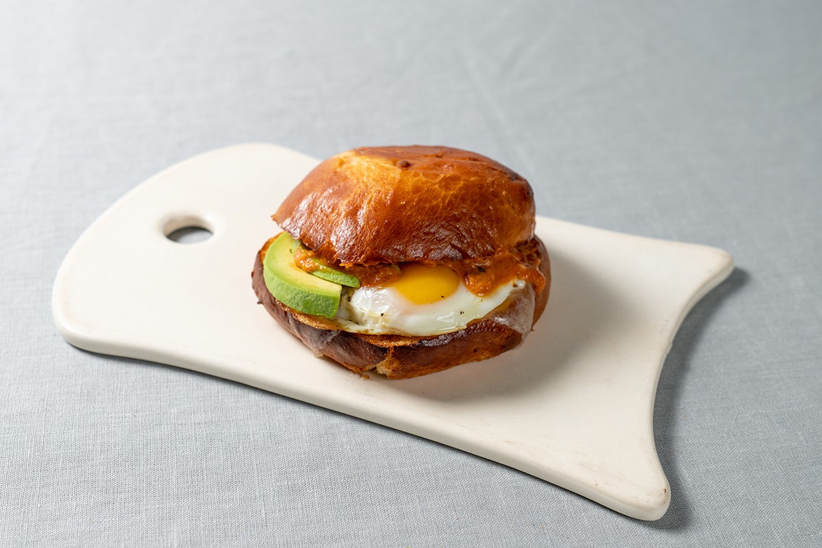 Order Cheddar, Avocado & Tomato-Pepper Jam Breakfast Sandwich food online from Le Pain Quotidien store, Claremont on bringmethat.com