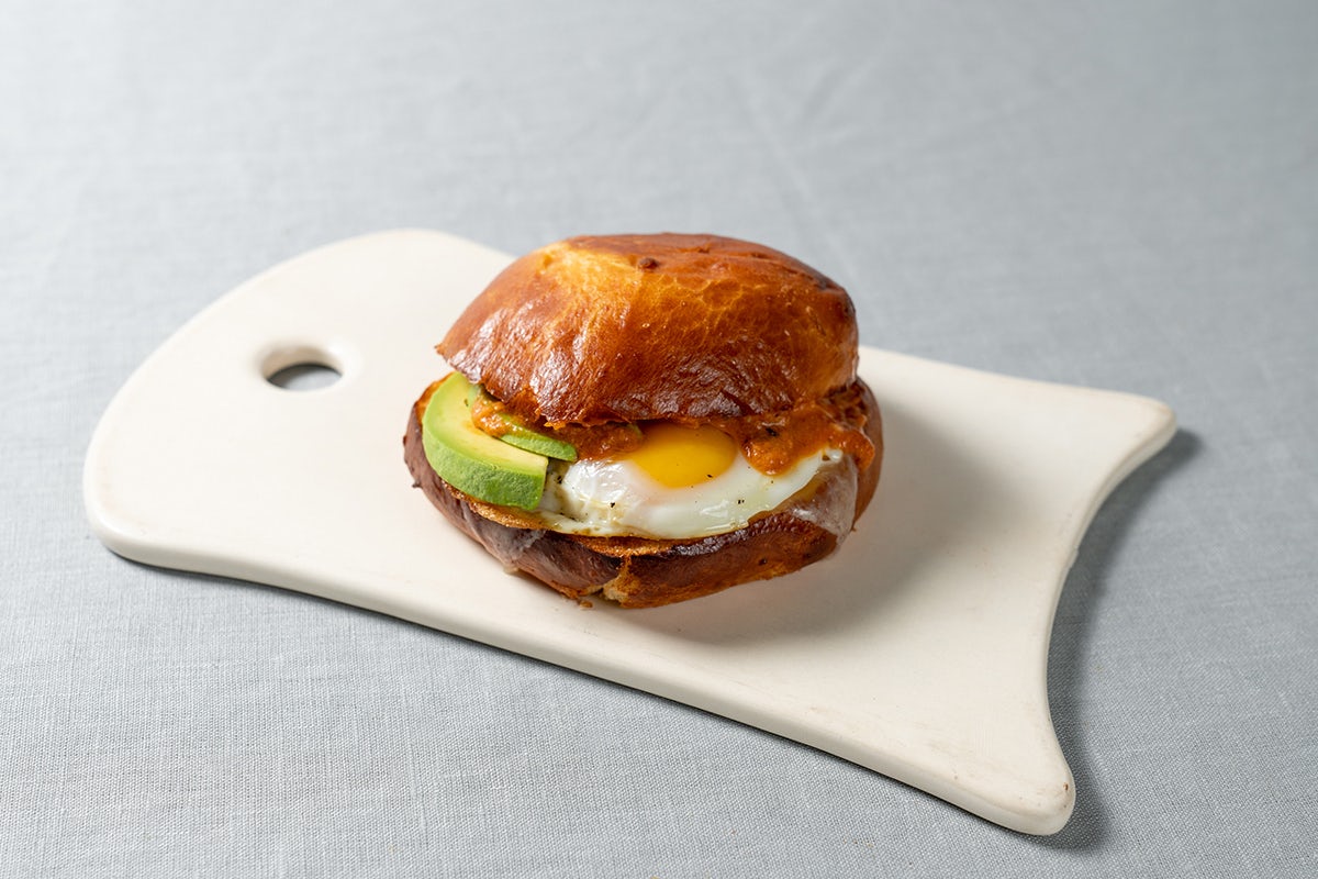 Order Cheddar, Avocado & Tomato-Pepper Jam Breakfast Sandwich food online from Le Pain Quotidien store, Marina Del Rey on bringmethat.com