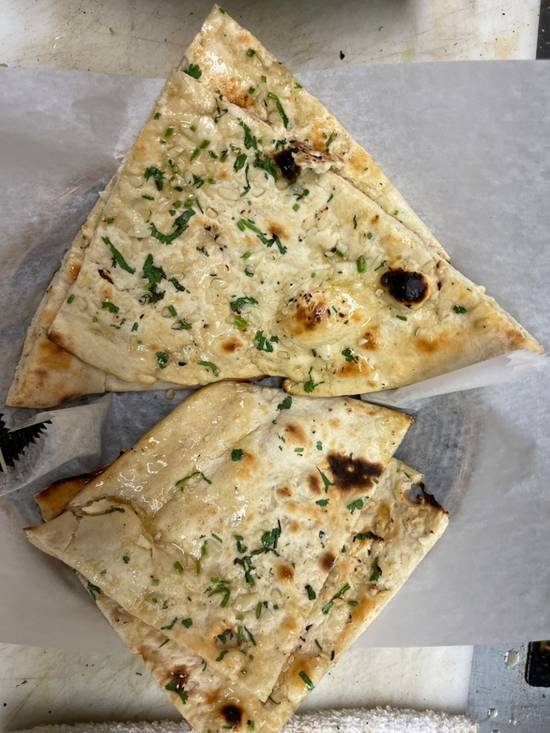 Order Garlic Naan food online from Mintt store, Pittsburgh on bringmethat.com
