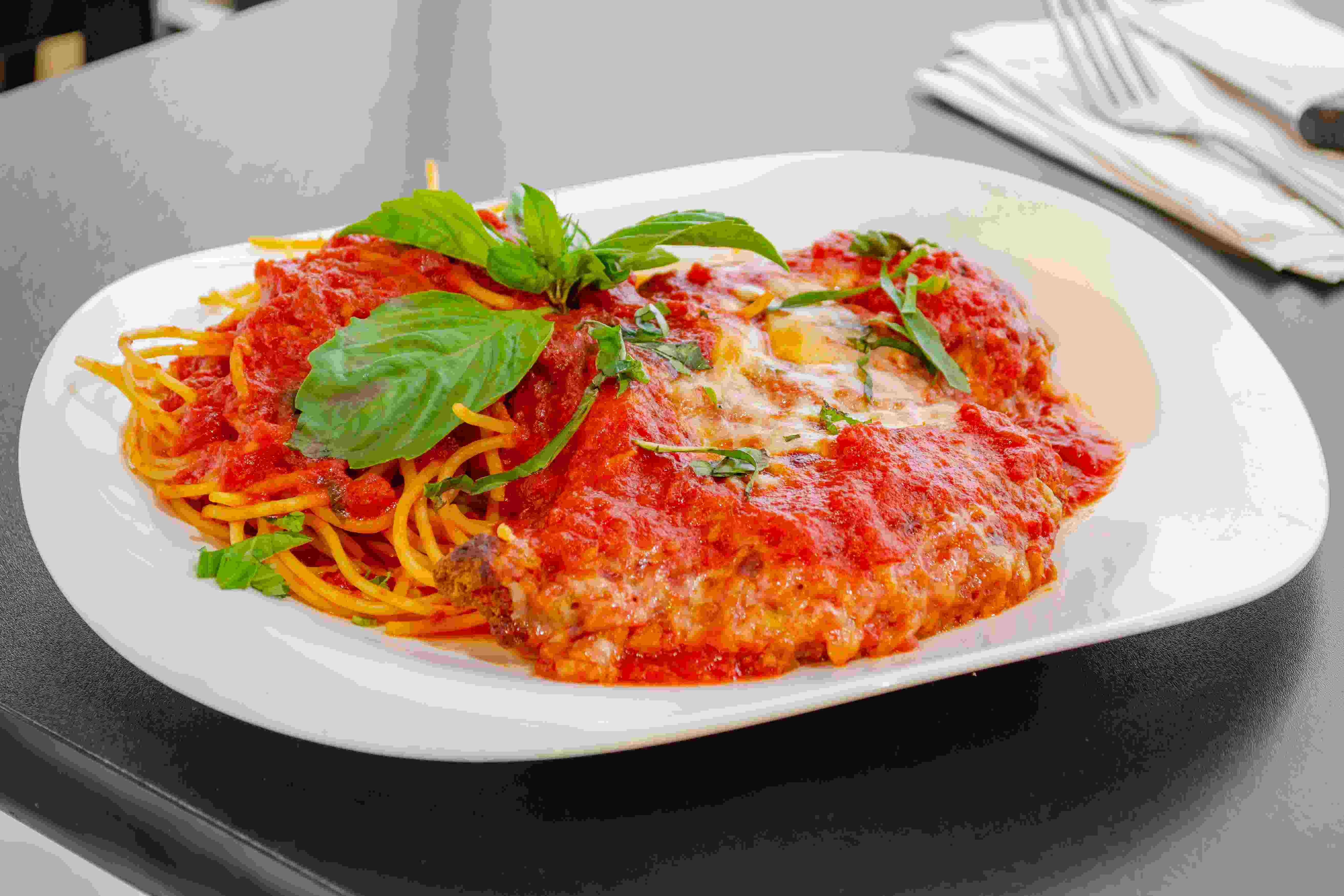 Order Chicken Parmigiana - Entrees food online from Brooklyn Pizza store, Stirling on bringmethat.com