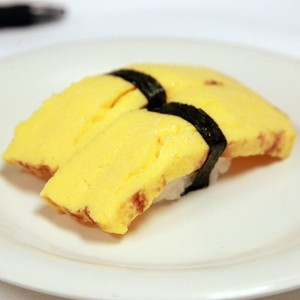 Order 2 Piece Egg Sushi food online from Sushi Koo store, Los Angeles on bringmethat.com