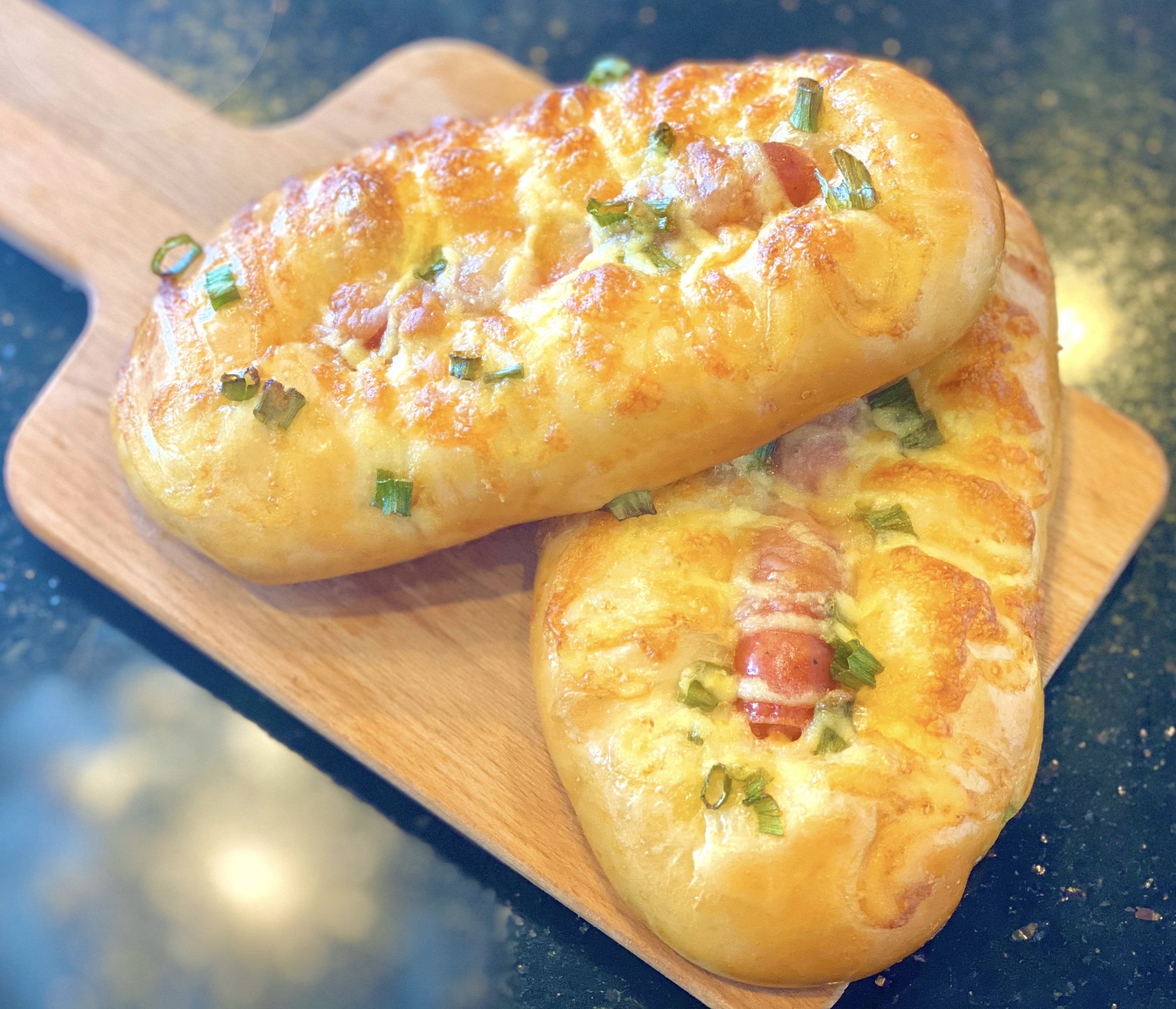 Order Sausage & Cheese Bread x2 葱香肠仔包 2个 food online from 1ny Bakery & Cafe store, West Lafayette on bringmethat.com