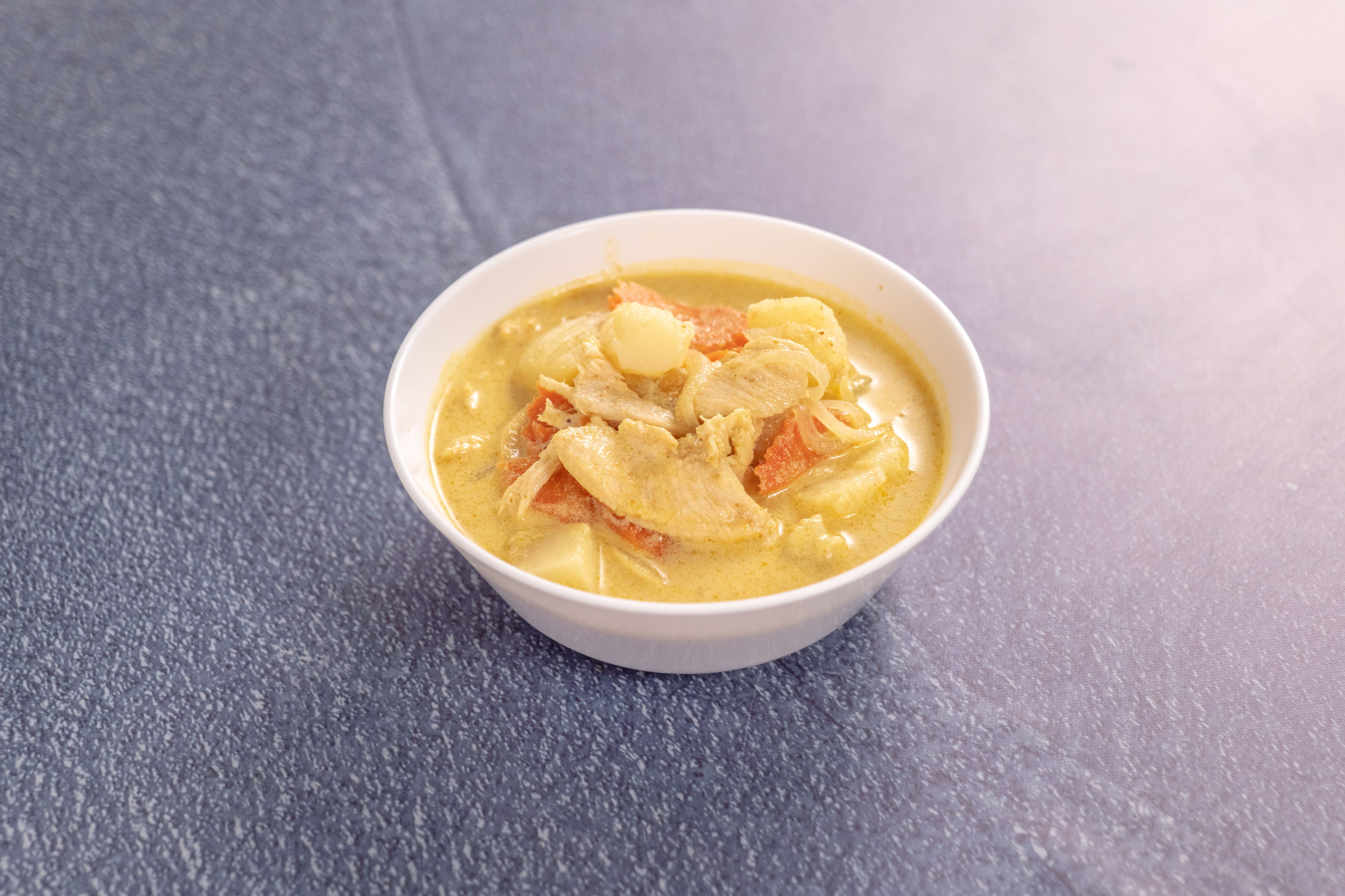 Order Yellow Curry food online from Cancoon Thai Restaurant store, Bellflower on bringmethat.com