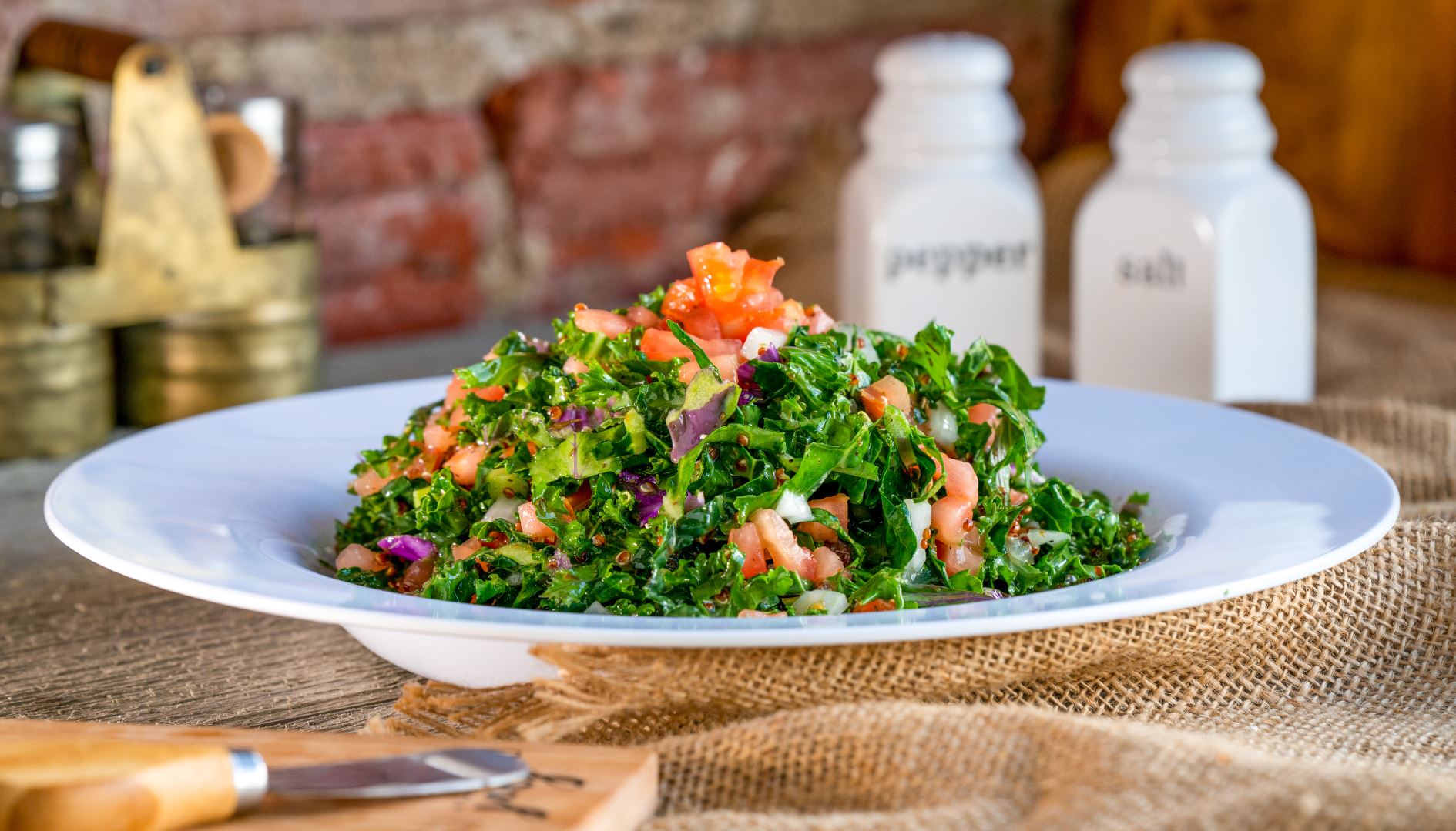 Order Kale Quinoa Salad food online from The Butcher Grille store, Dearborn on bringmethat.com