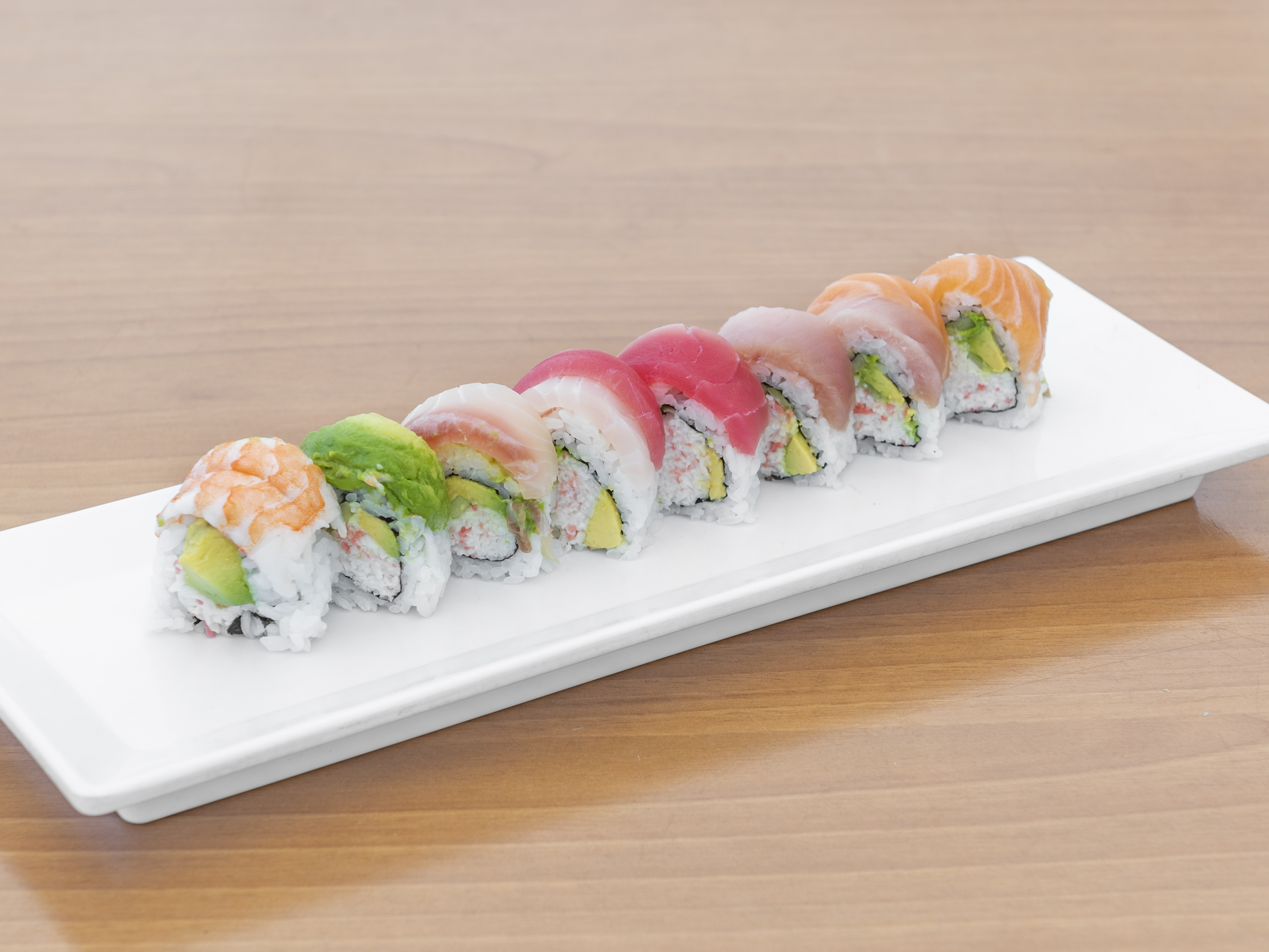Order Rainbow Roll food online from Gin Sushi store, Pasadena on bringmethat.com