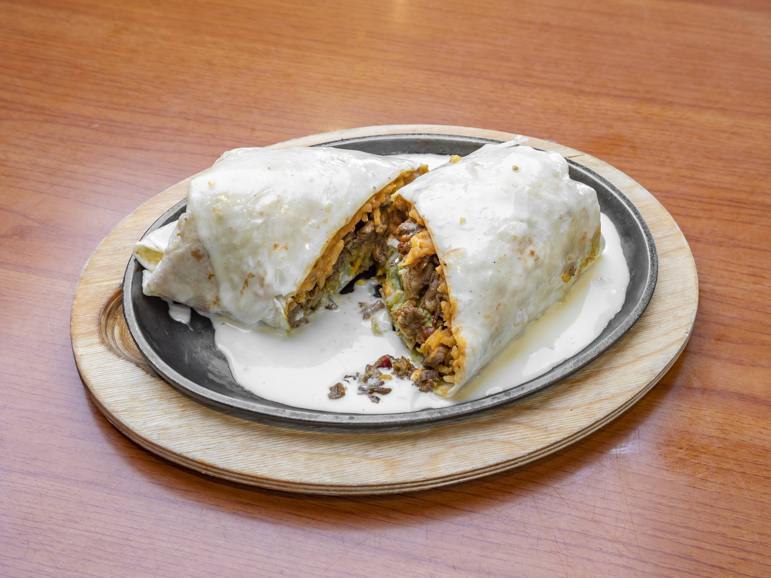 Order El Chapo Burrito food online from La Cocina del Rey store, Grovetown on bringmethat.com