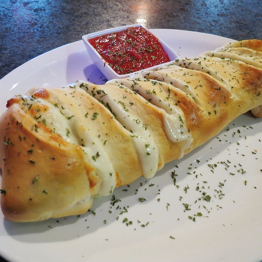 Order Make Your Own Stromboli - Stromboli food online from Nicky's Pizza store, Sheboygan on bringmethat.com
