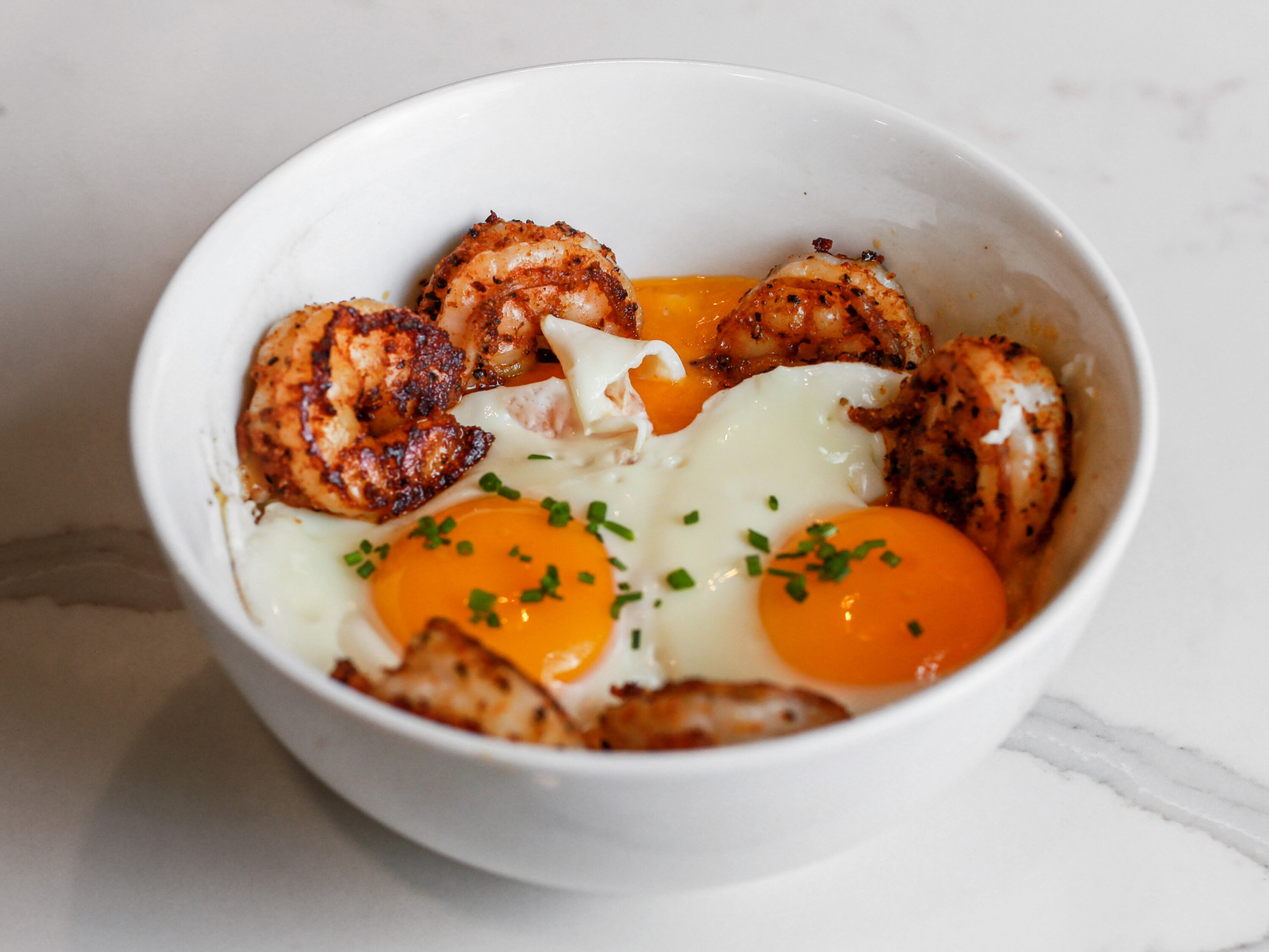 Order Grits Shrimp and Eggs Bowl food online from Tiffany Diner store, Philadelphia on bringmethat.com