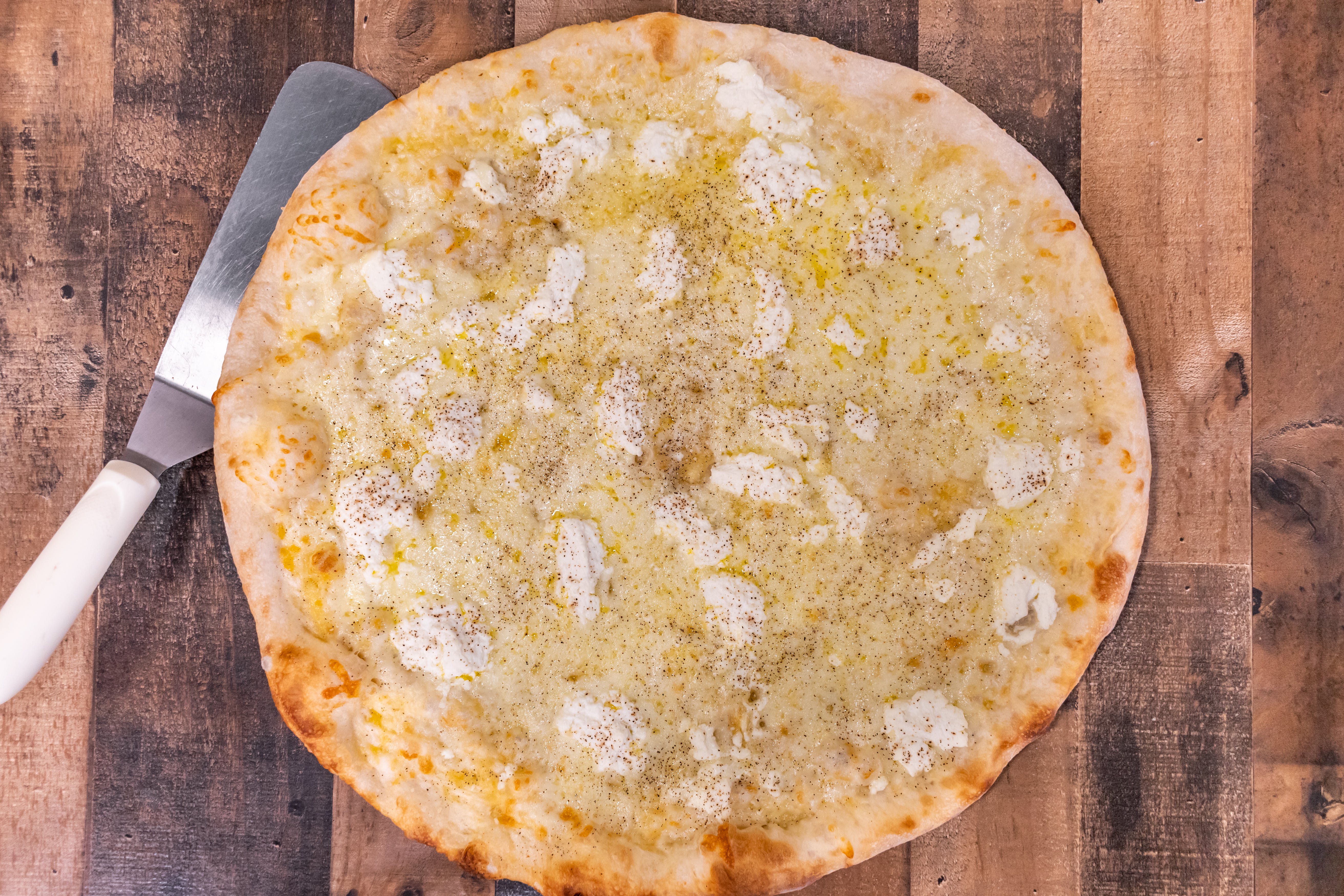 Order White Pizza - Large 14" (8 Slices) food online from Bella Pizzeria - Carmel store, Carmel on bringmethat.com