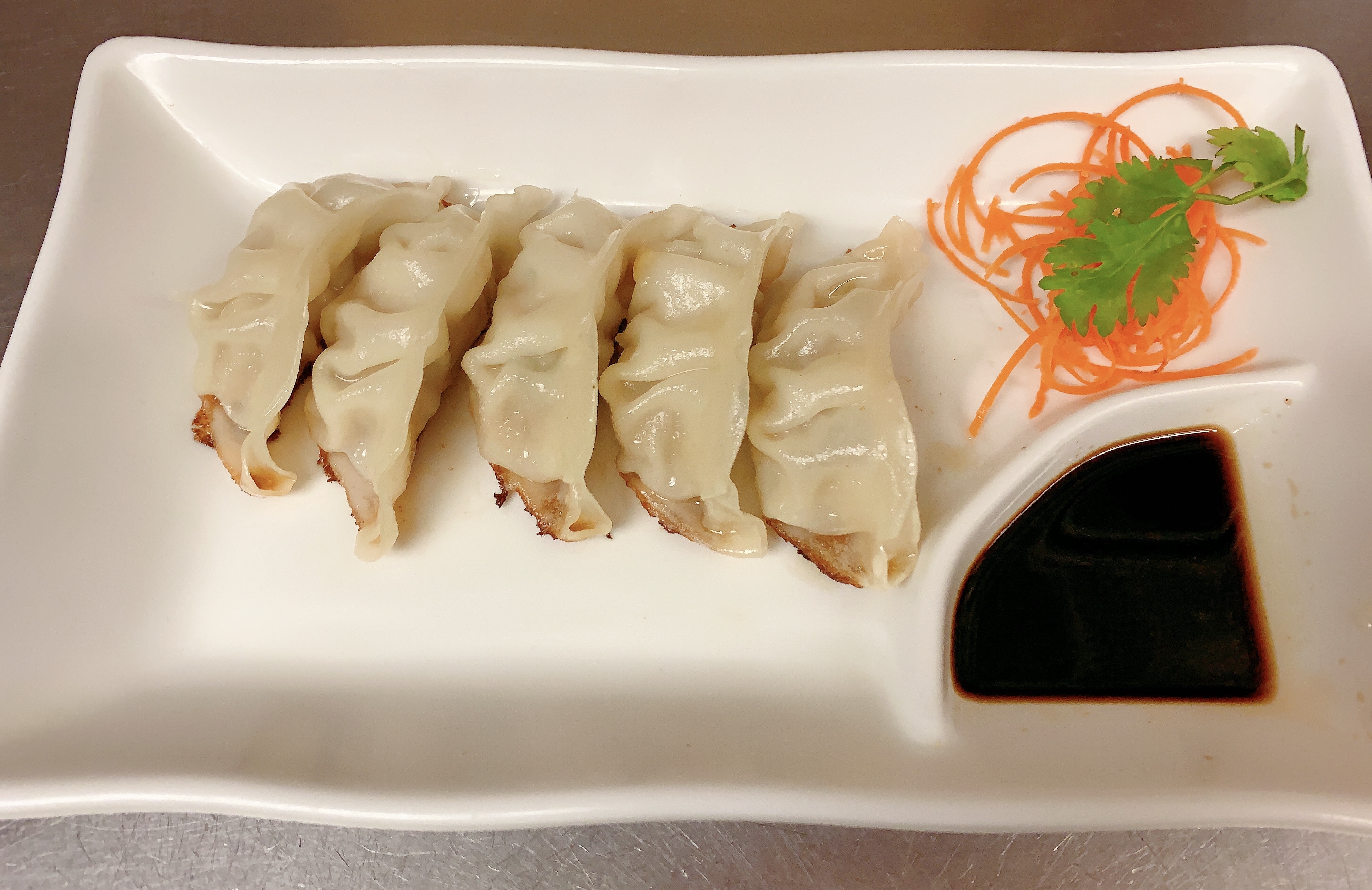 Order Pork Gyoza food online from Blue Wazabi store, Madison on bringmethat.com