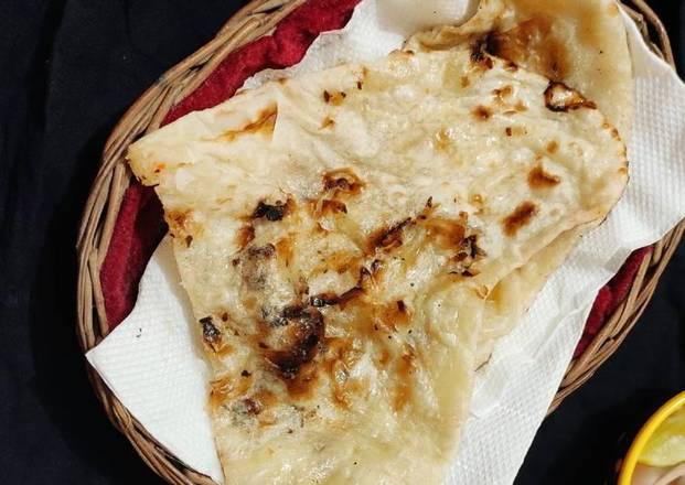 Order Butter Naan food online from Sansar Indian Restaurant store, Tracy on bringmethat.com