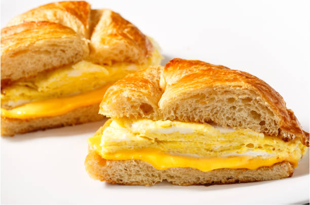 Order 2 Eggs in a Croissant Sandwich Breakfast food online from Christos' mini mart store, Jersey City on bringmethat.com