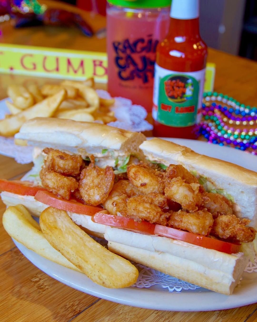 Order Shrimp Po Boy food online from Ragin Cajun Cafe store, Redondo Beach on bringmethat.com