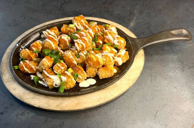 Order NEW! Buffalo Tots food online from East Coast Wings + Grill store, Waxhaw on bringmethat.com