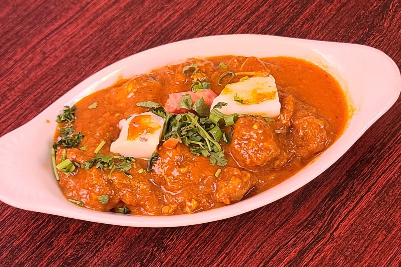 Order Chicken Vindaloo food online from Om Indian Cuisine store, San Francisco on bringmethat.com
