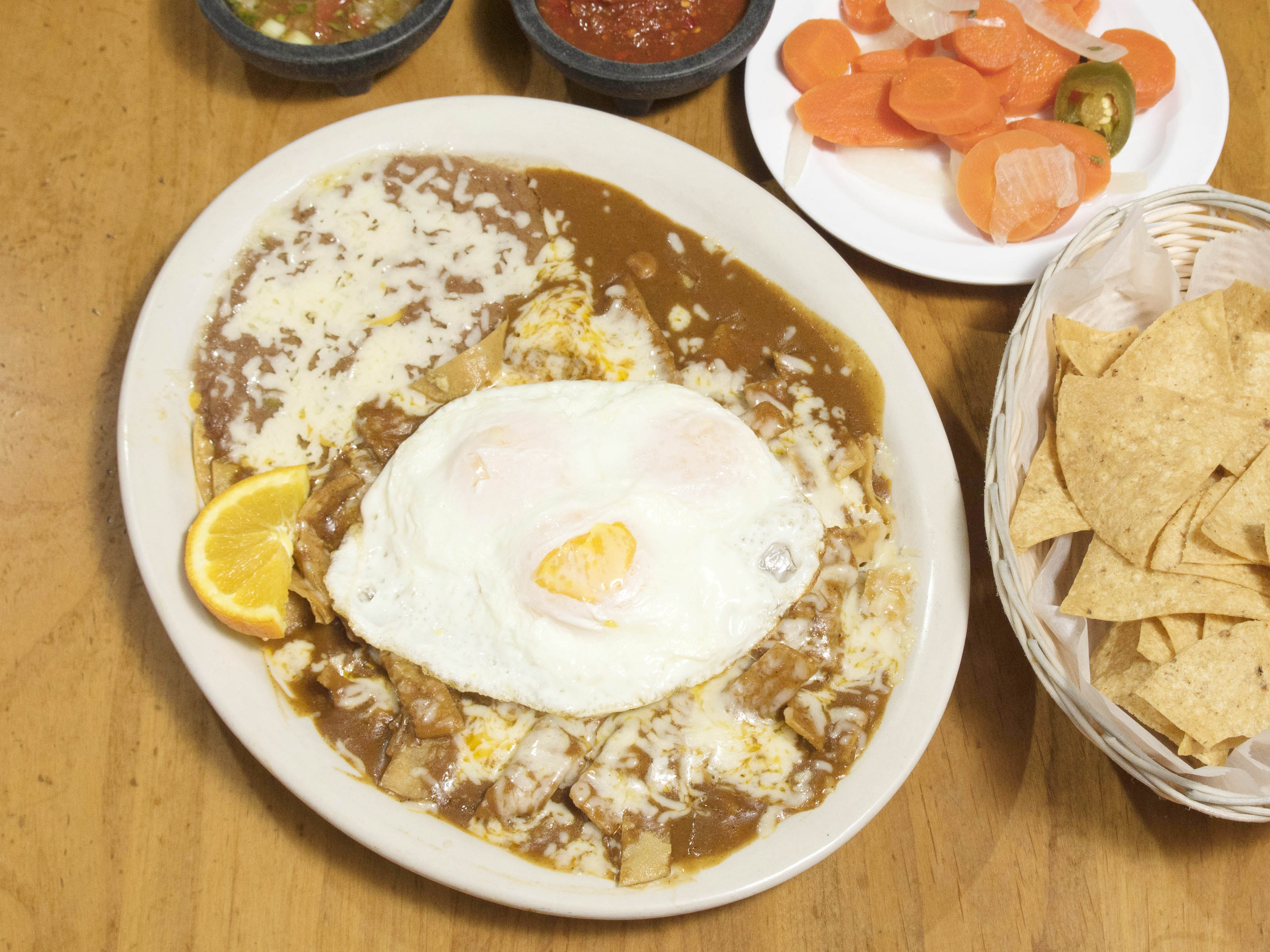Order Chilaquiles food online from Jalisco Cafe Mexican Restaurant(Palm Avenue) store, San Diego on bringmethat.com