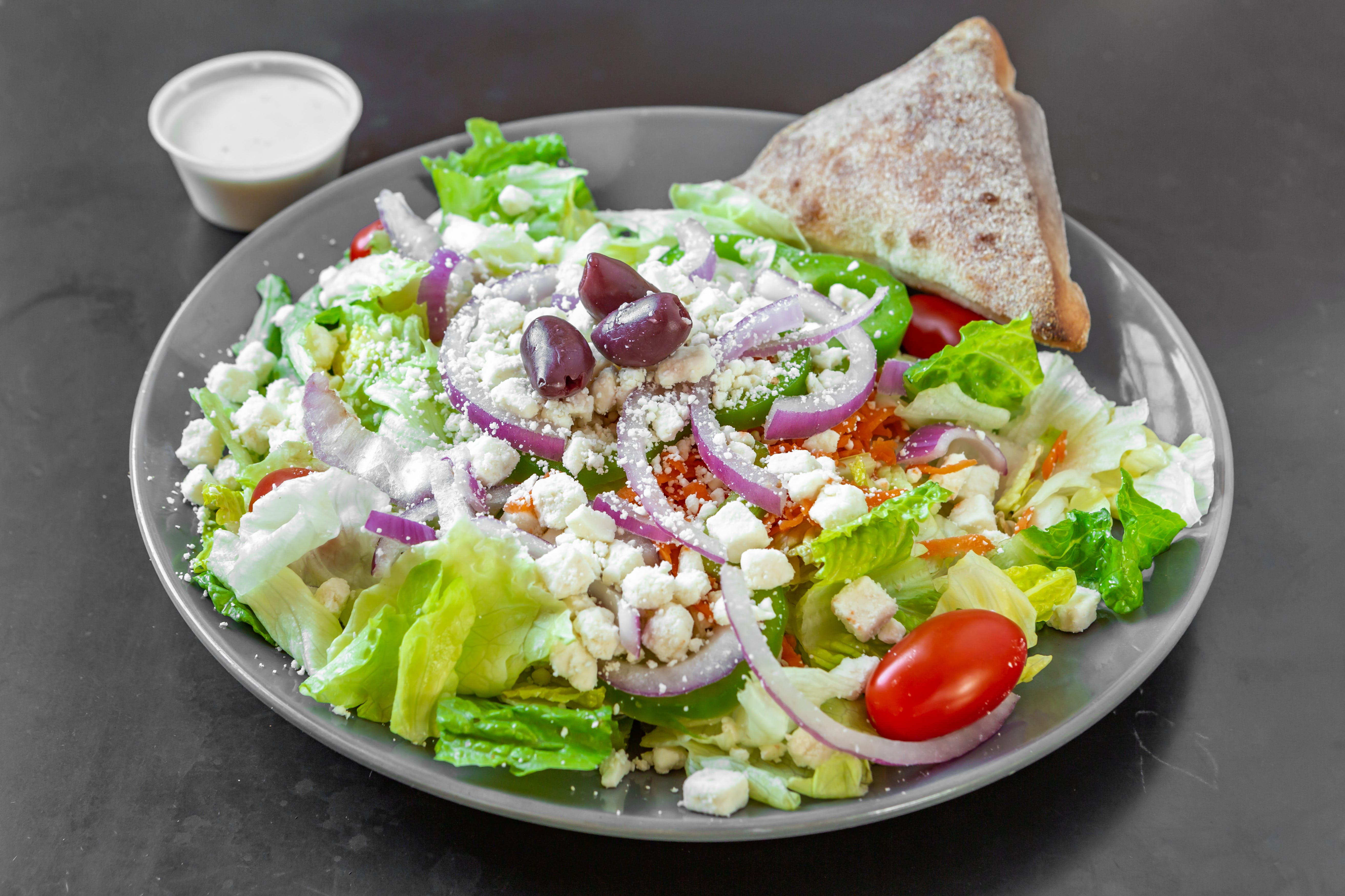 Order Greek Salad - Salad food online from Pizza By Rocco store, Natick on bringmethat.com