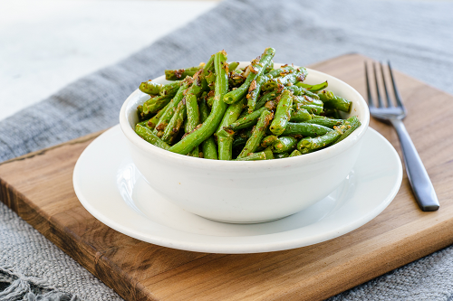 Order Buttery Garlic Green Beans food online from Homeroom store, Oakland on bringmethat.com