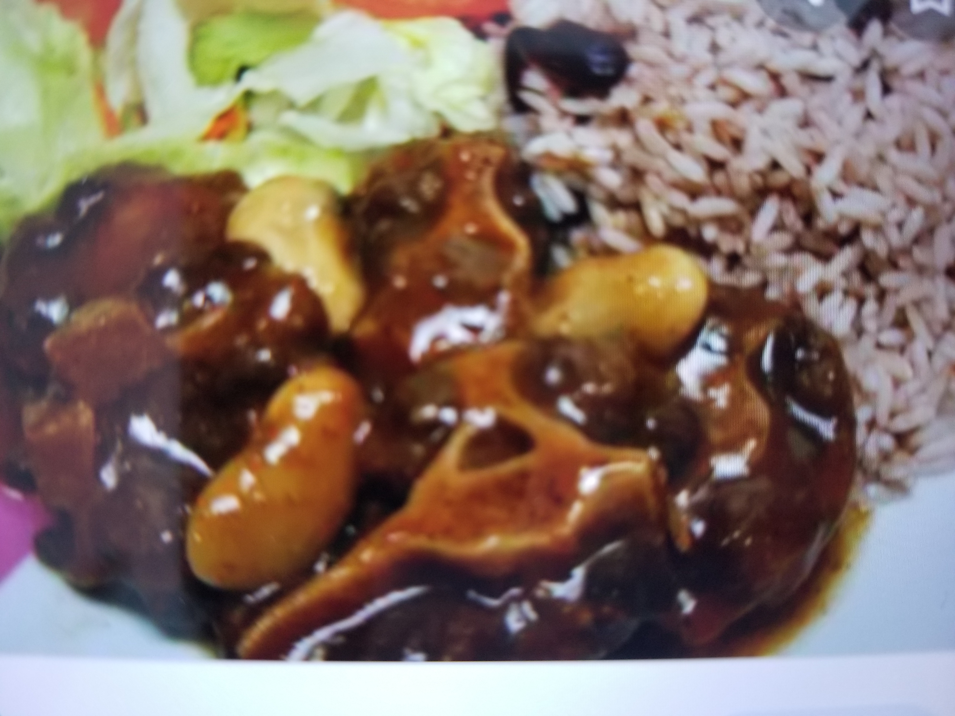 Order Oxtail food online from Huzzys Jamaican Restaurant store, Houston on bringmethat.com